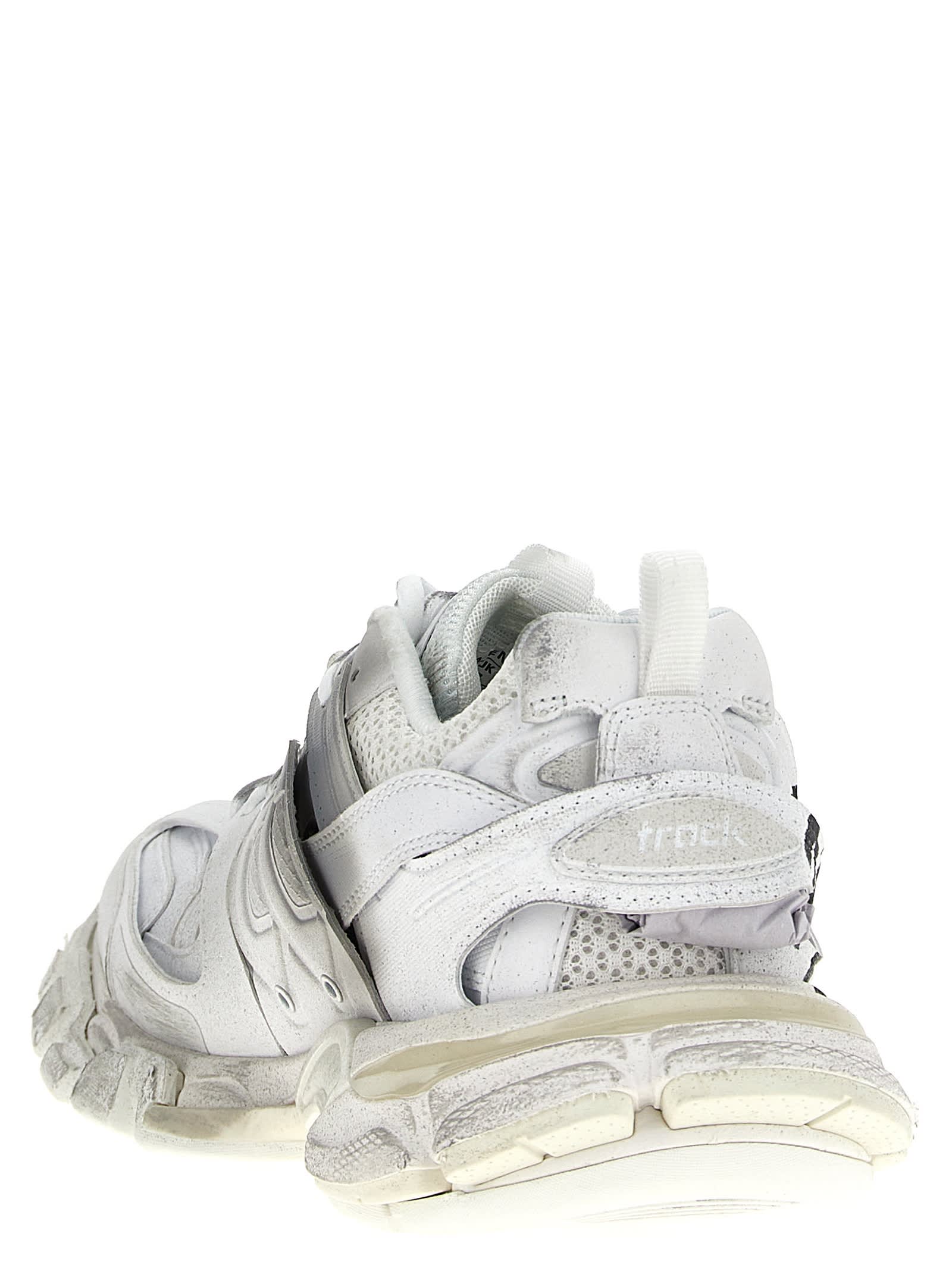 Shop Balenciaga Track Sneakers In White/black