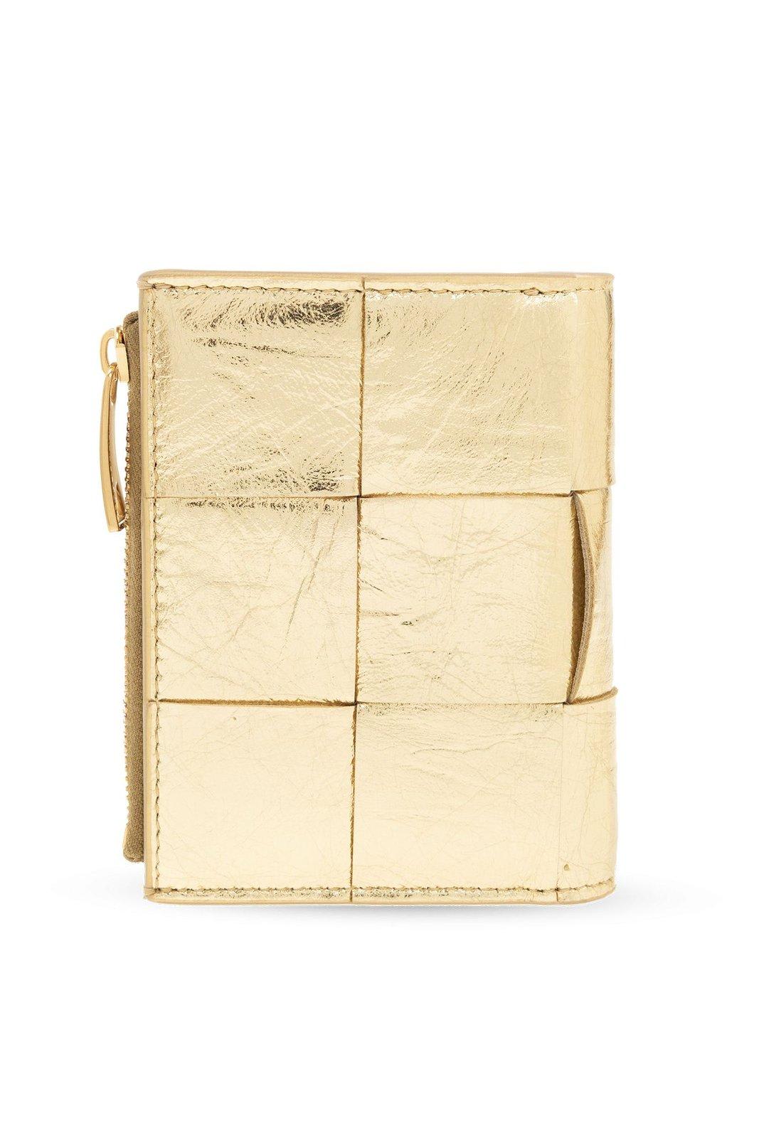 Shop Bottega Veneta Cassette Small Bi-fold Zip Wallet In Gold-gold