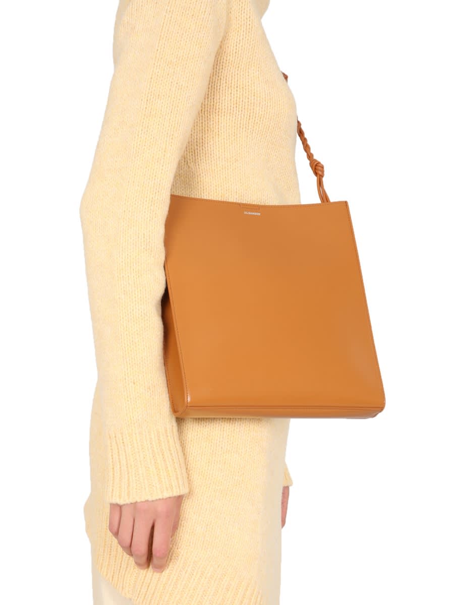 Shop Jil Sander Long Asymmetric Sweater In Yellow