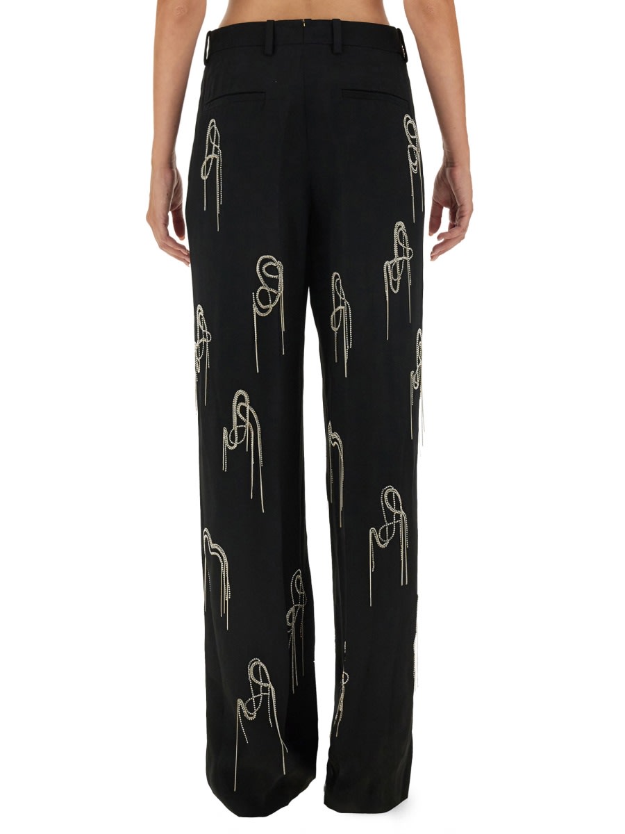 Shop Dries Van Noten Wide Leg Pants In Black