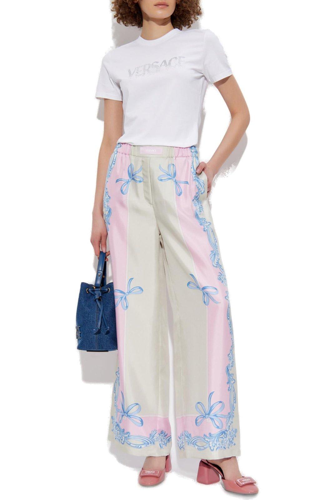 Versace Silk Twill Pajama-style Trousers With Medusa Cameo Print