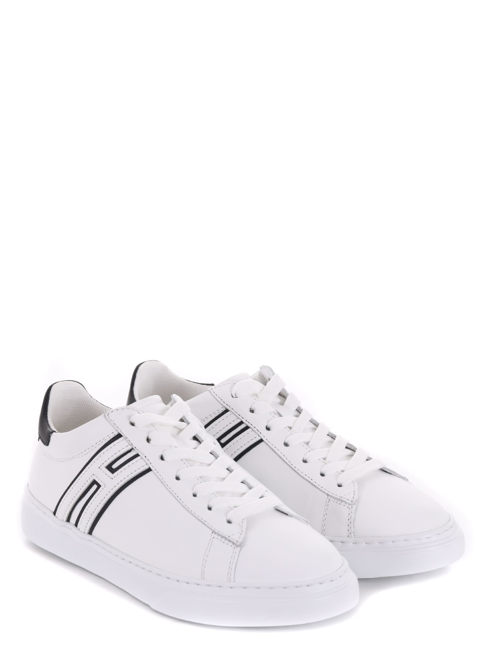 Shop Hogan Sneakers In White