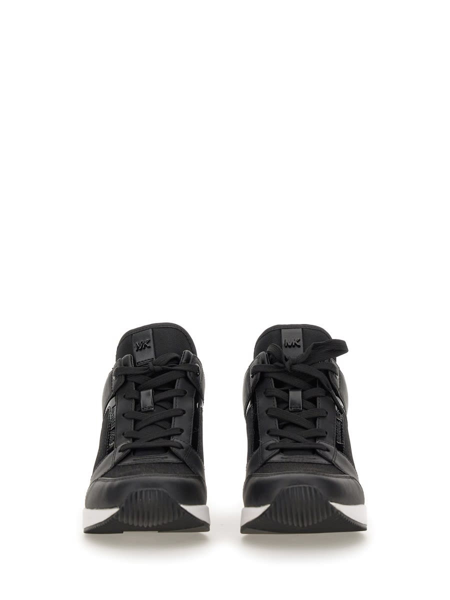 Shop Michael Kors Georgie Sneaker In Black