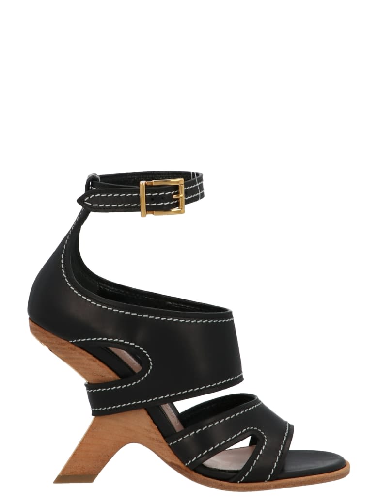 Alexander Mcqueen Leather Upper And Rubber In Black Gold