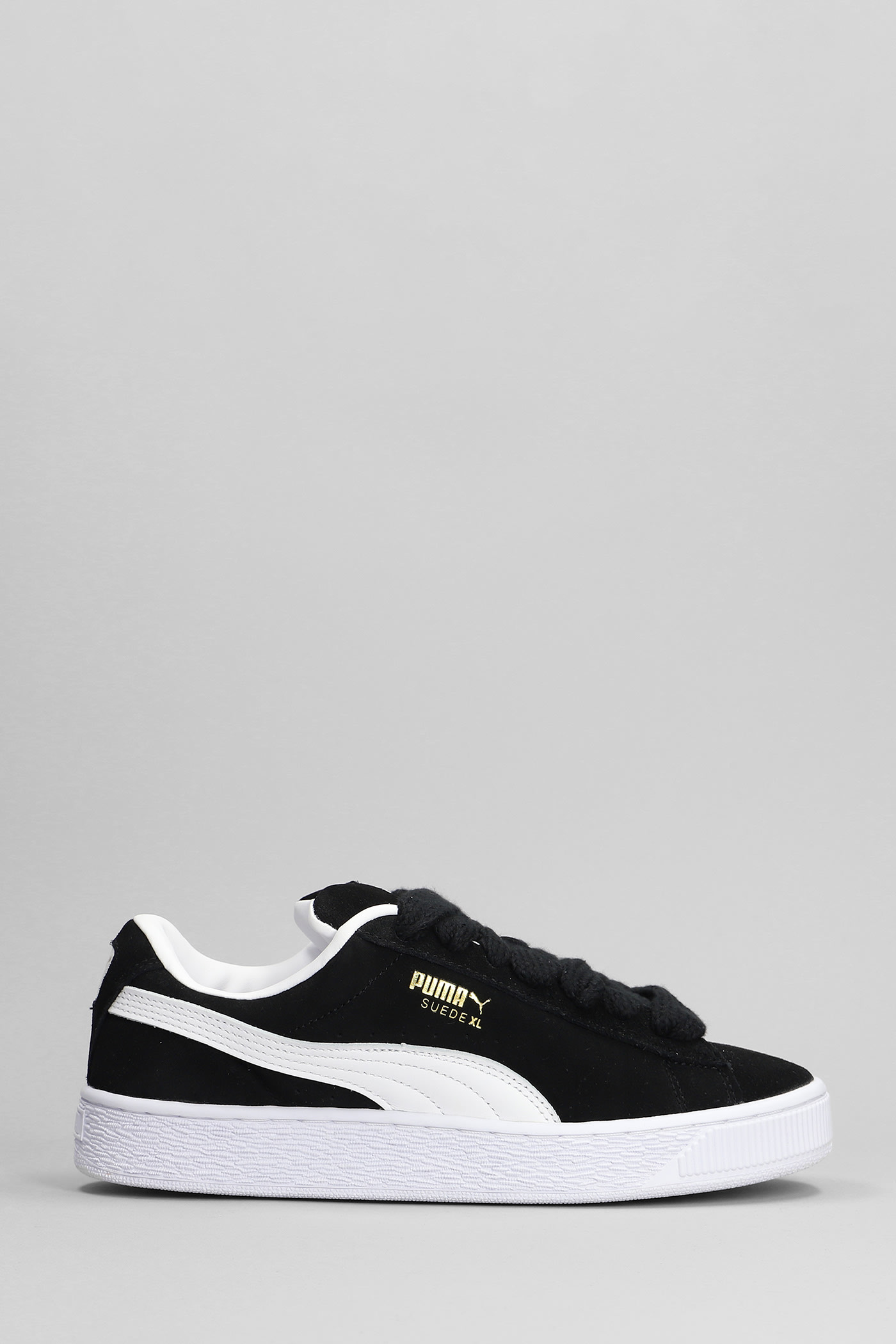 Shop Puma Suede Xl Sneakers In Black Suede