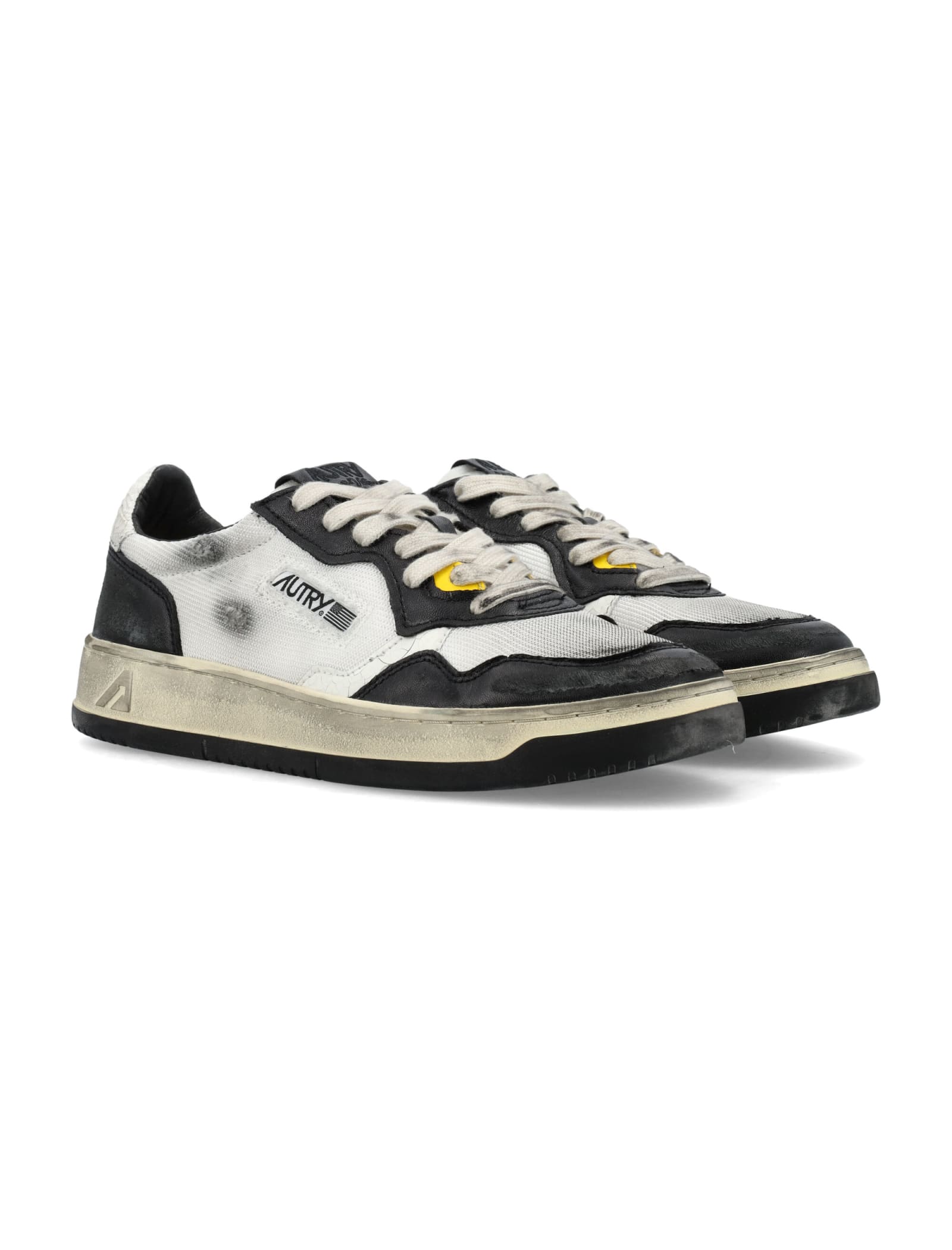 Shop Autry Super Vintage Low Sneakers In White/silver