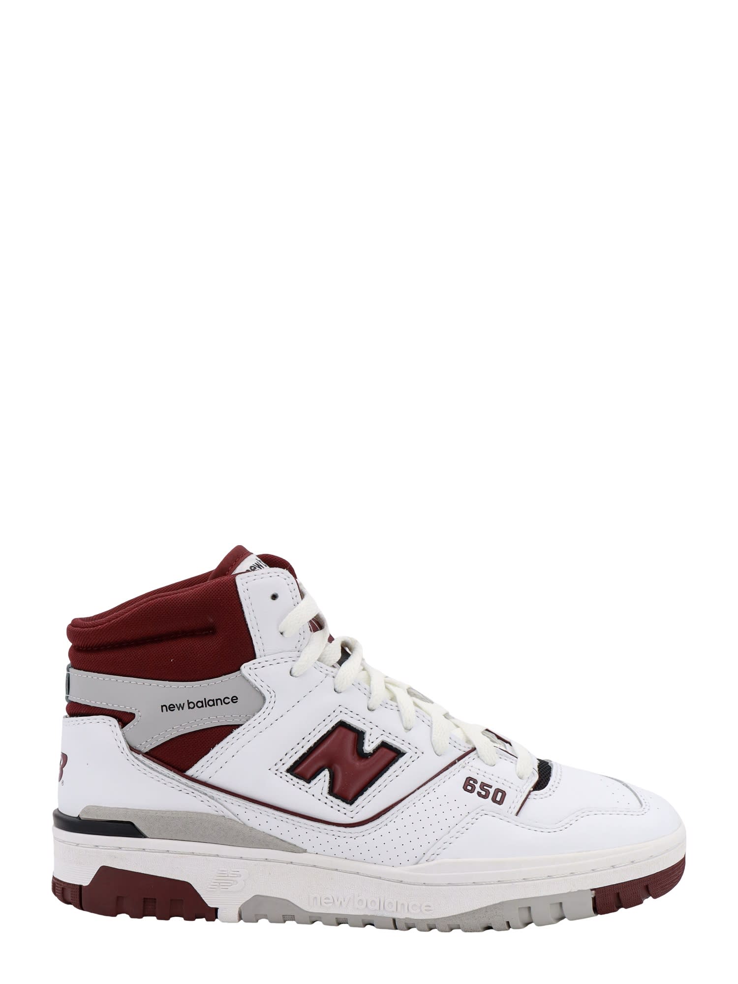 Shop New Balance 650 Sneakers In White