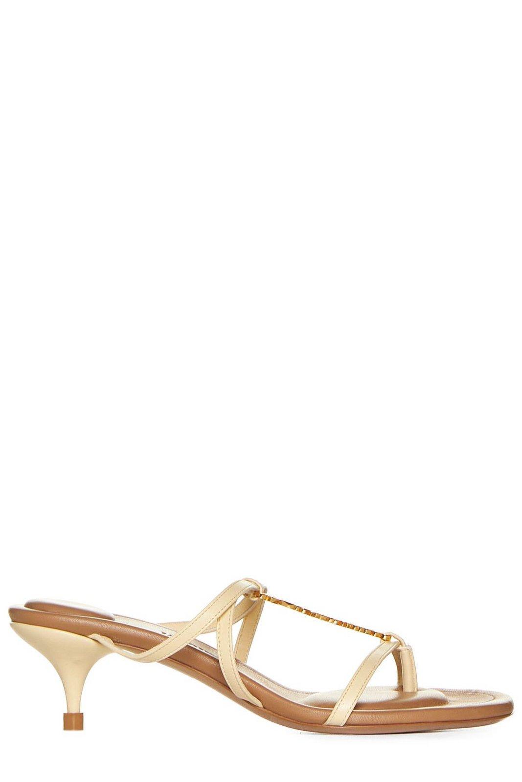 Shop Jacquemus Strappy Charm Mules In Ivory
