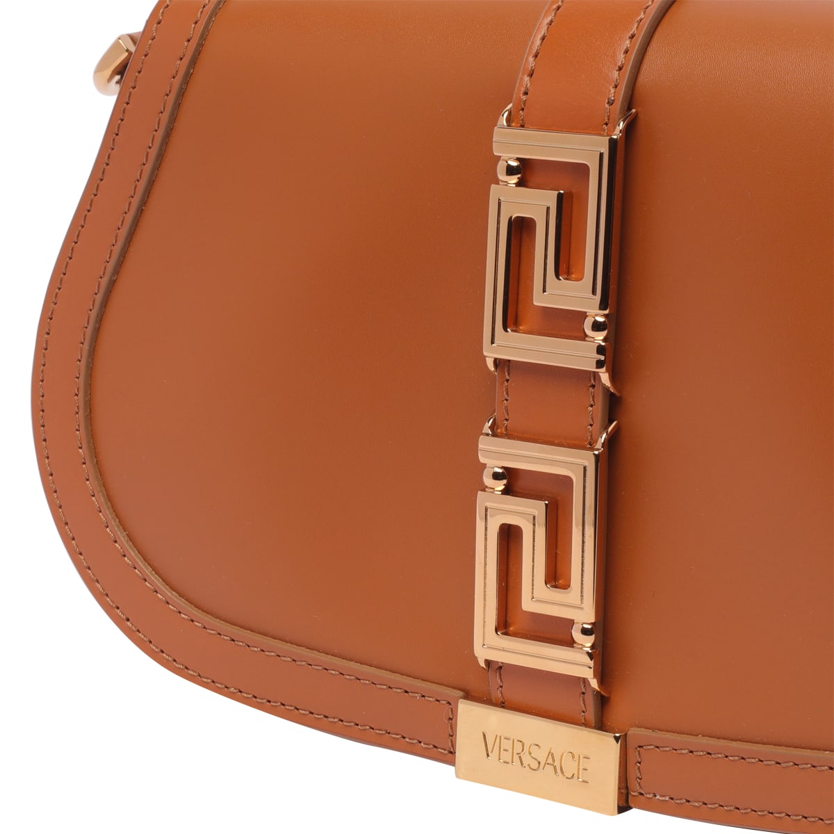 Shop Versace Greca Goddess Crossbody Bag In Brown