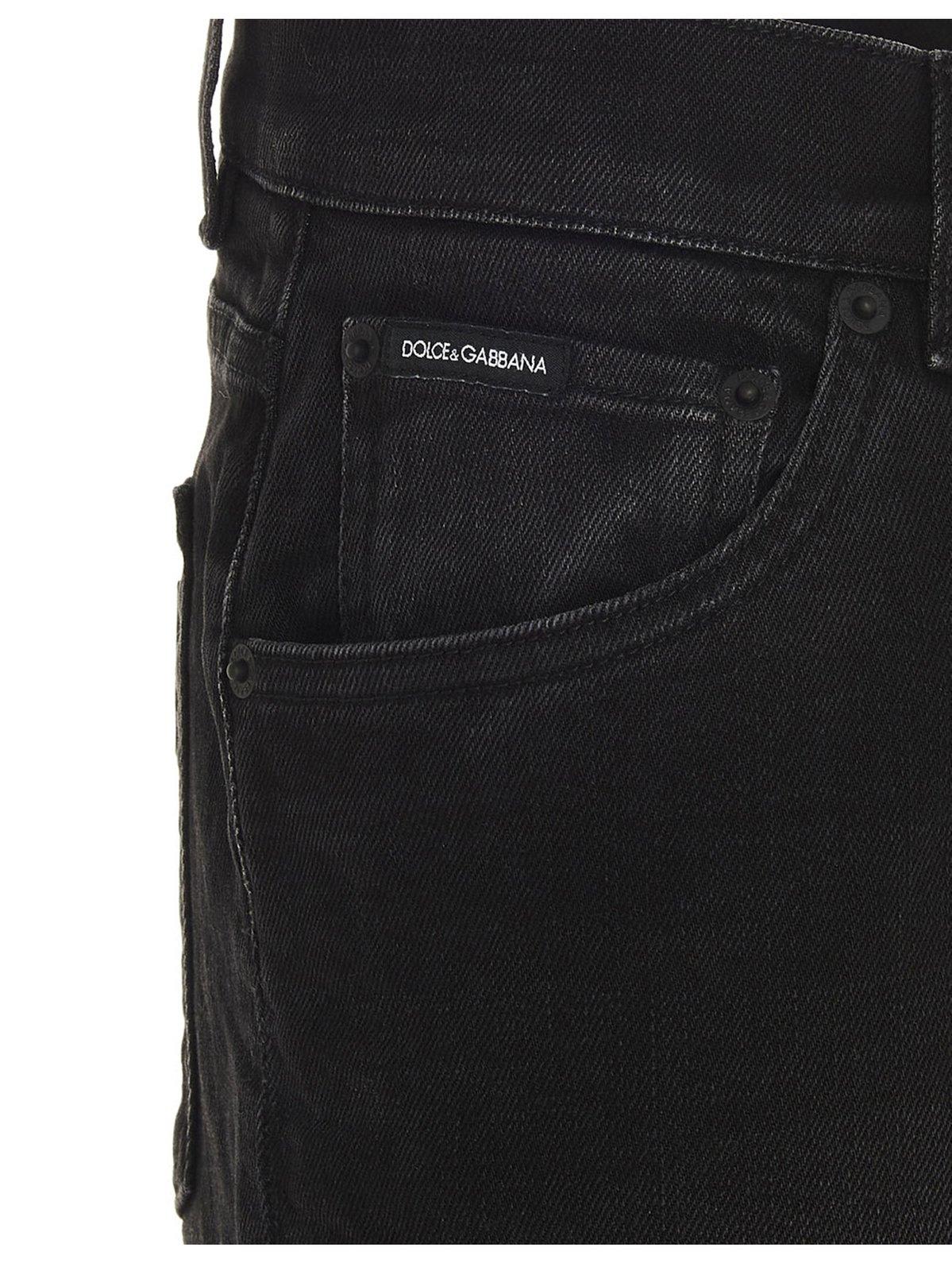 Shop Dolce & Gabbana Logo Patch Jeans In Varabbinata