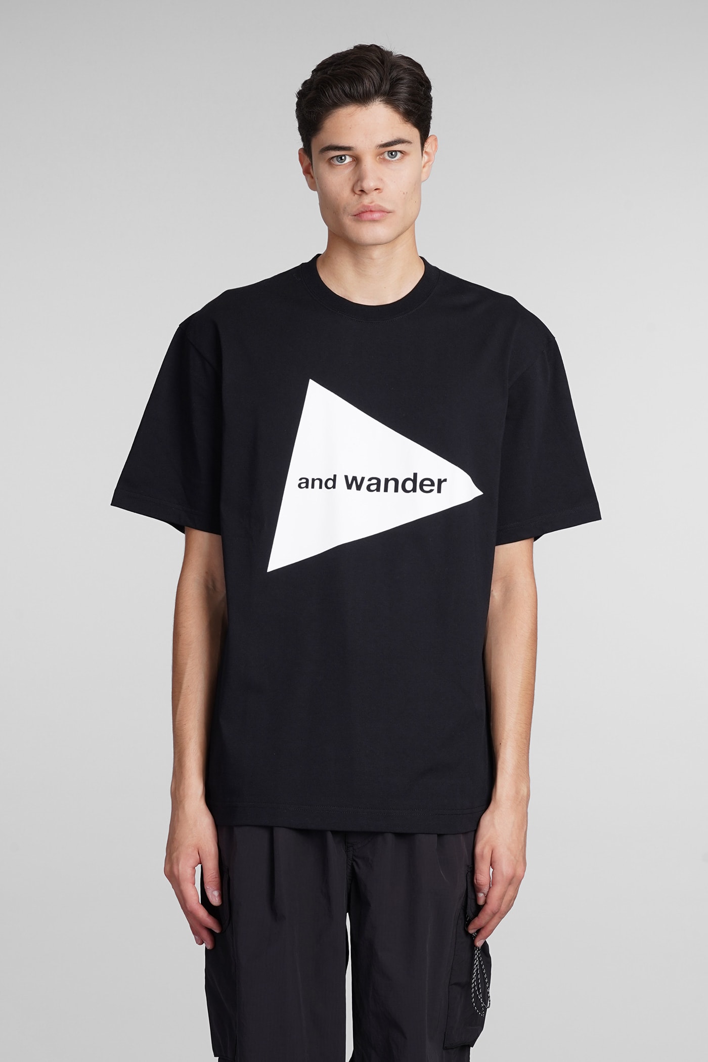 AND WANDER T-SHIRT IN BLACK COTTON