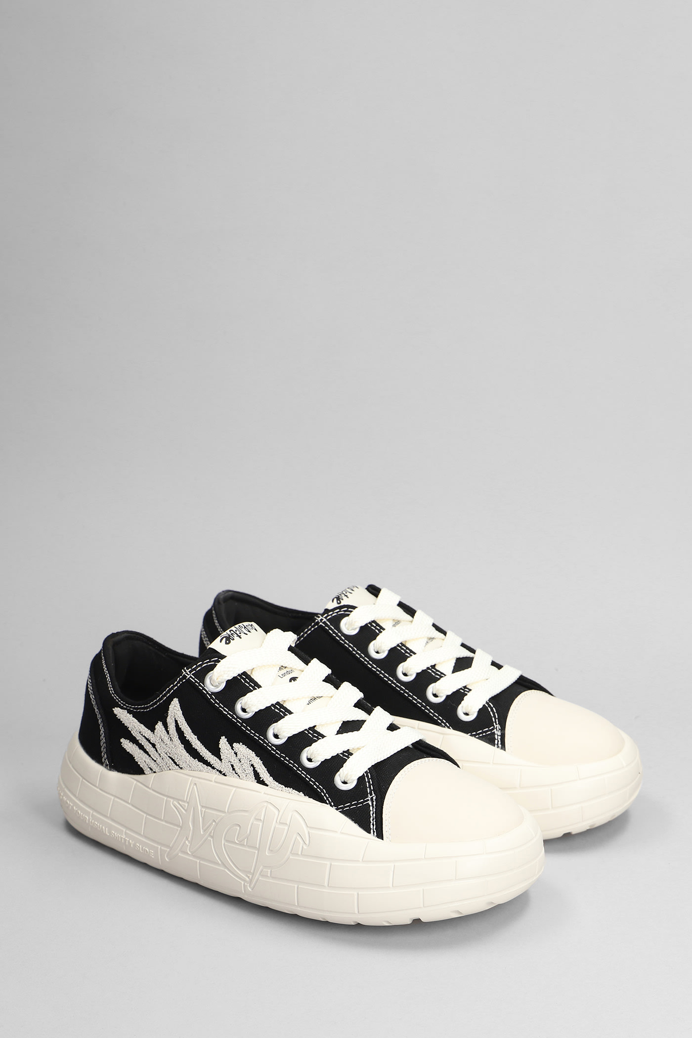 Shop Acupuncture Nyu Vulc G2 Sneakers In Black Canvas