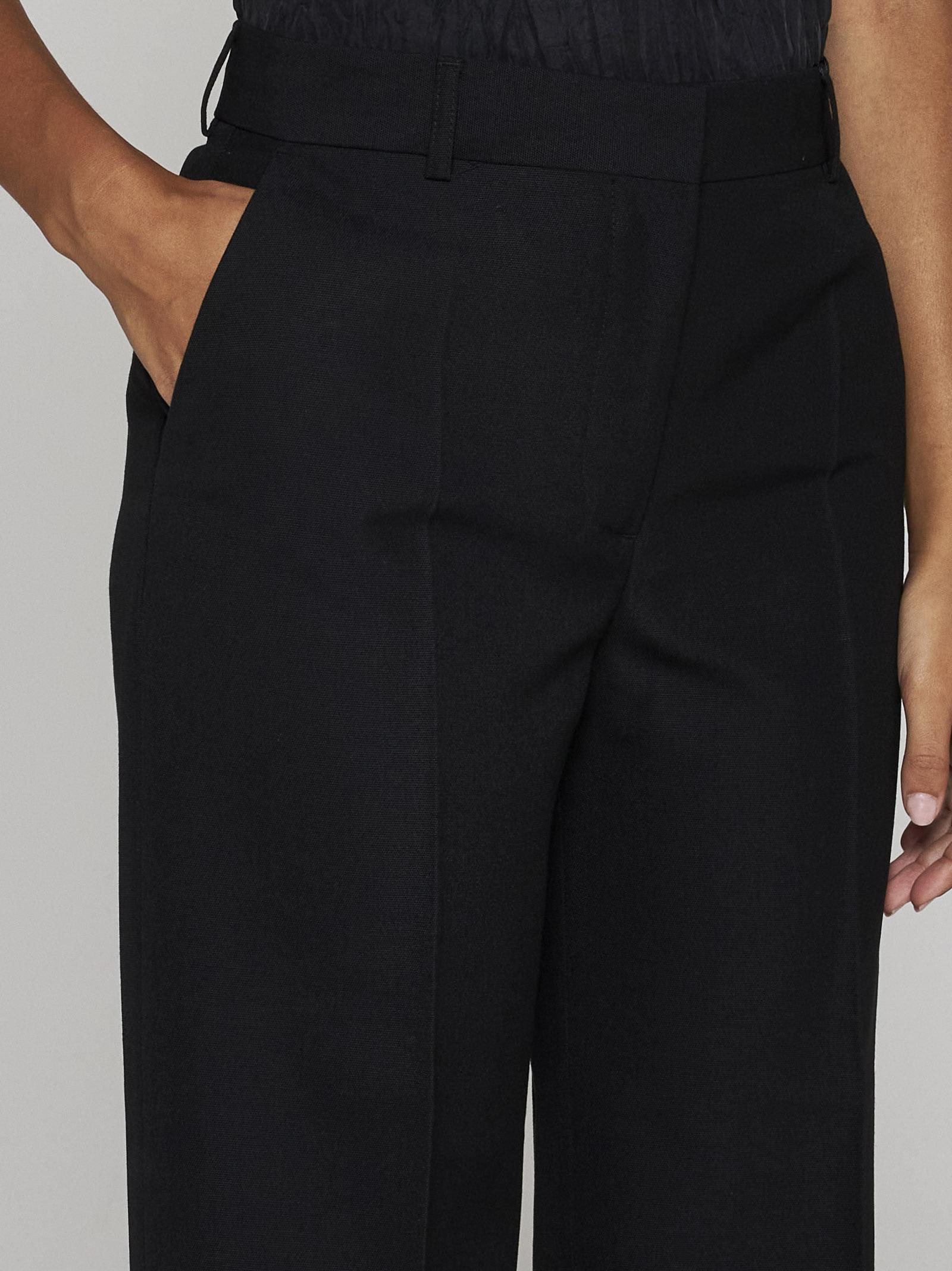 Shop Totême Wool-blend Tailored Trousers In Black