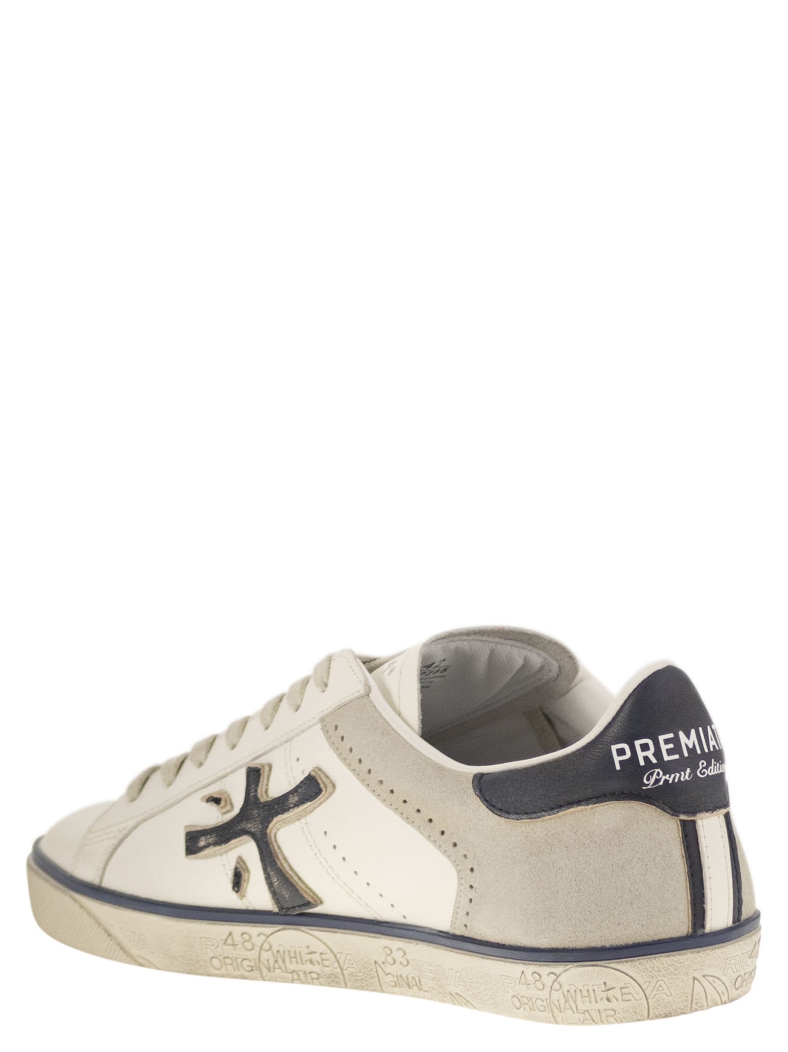 Premiata Steven Sneakers In White/blue