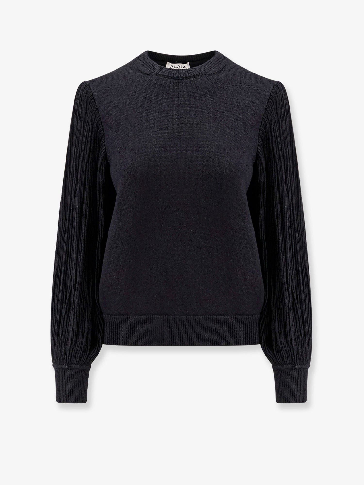 Alaïa Slit Fringe Sleeve Wool Crewneck Sweater In Black