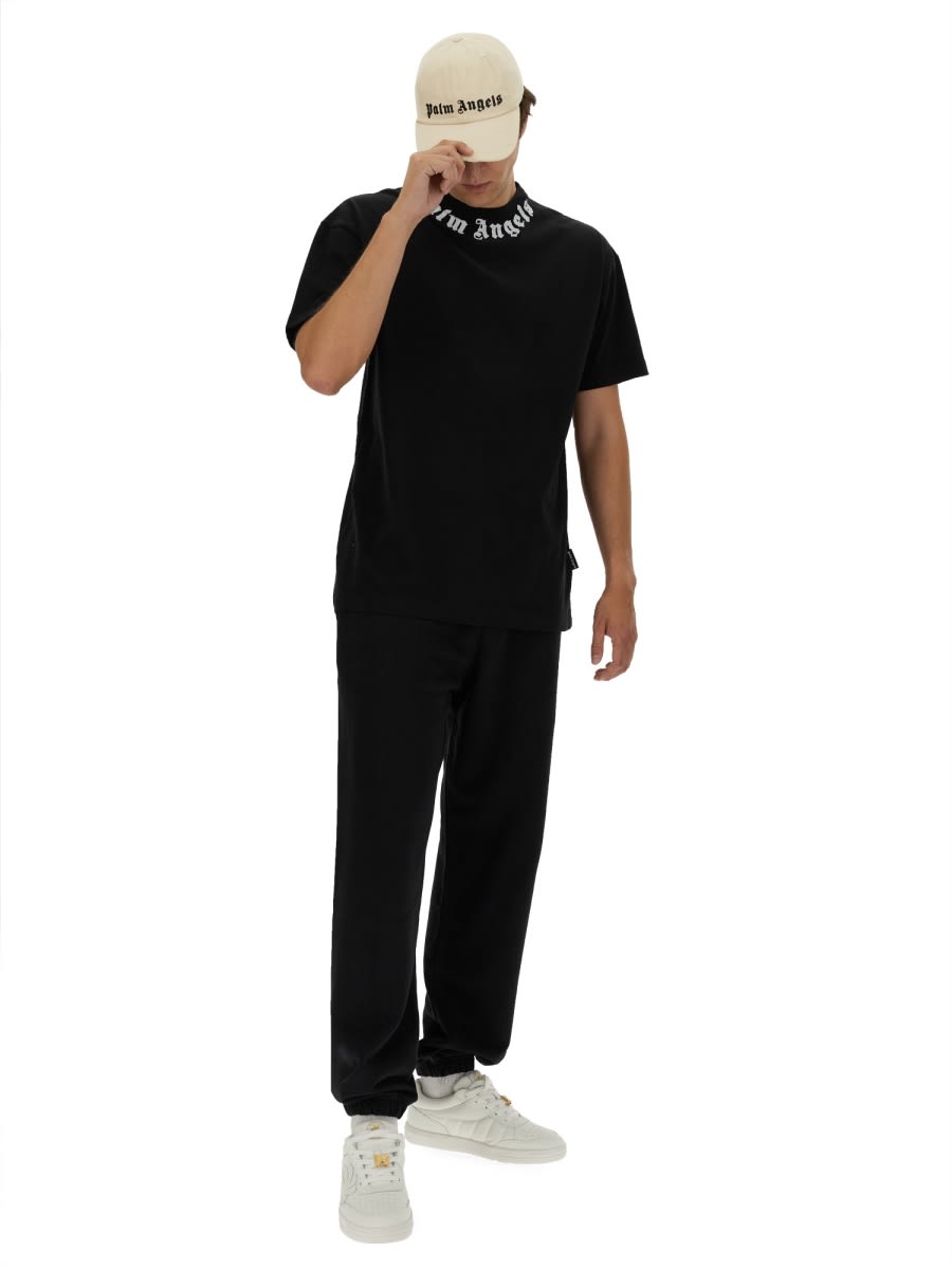 Shop Palm Angels Jogging Pants With Logo In Black