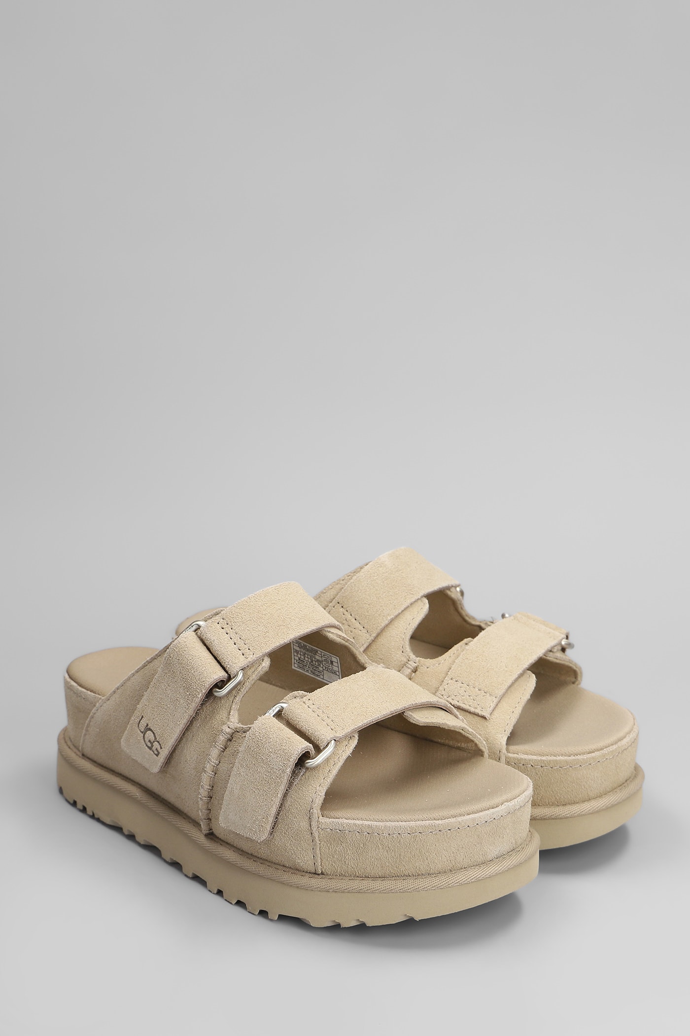 UGG GOLDENSTAR HI SLIPPER-MULE IN BEIGE SUEDE