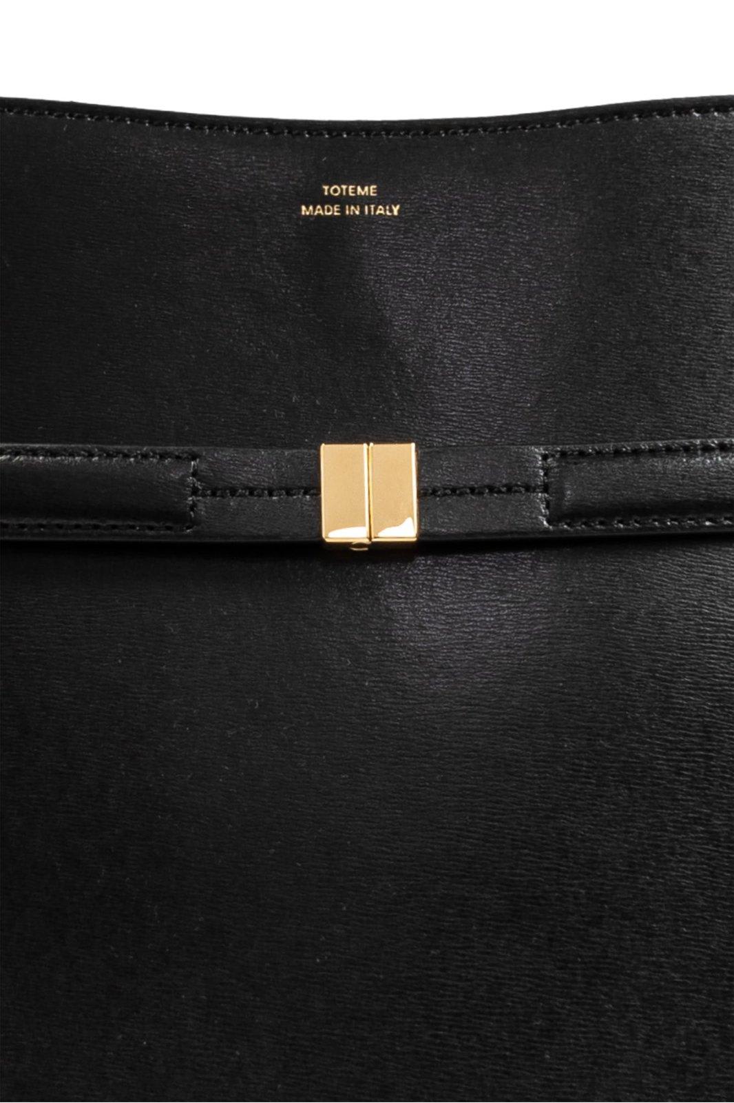 Totême Belted Palmellata Leather Bucket Bag In Black