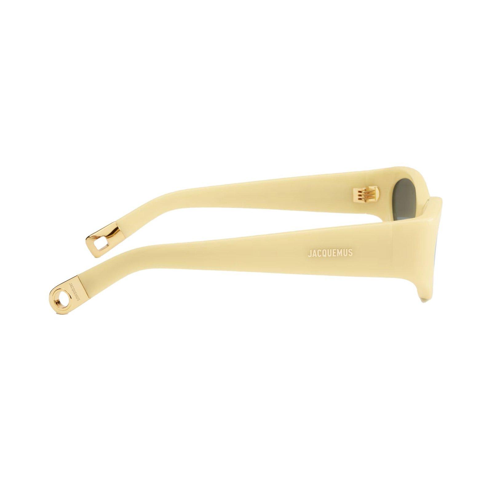 Shop Jacquemus Oval Frame Sunglasses In Ovalo Yellow Yellow Gold