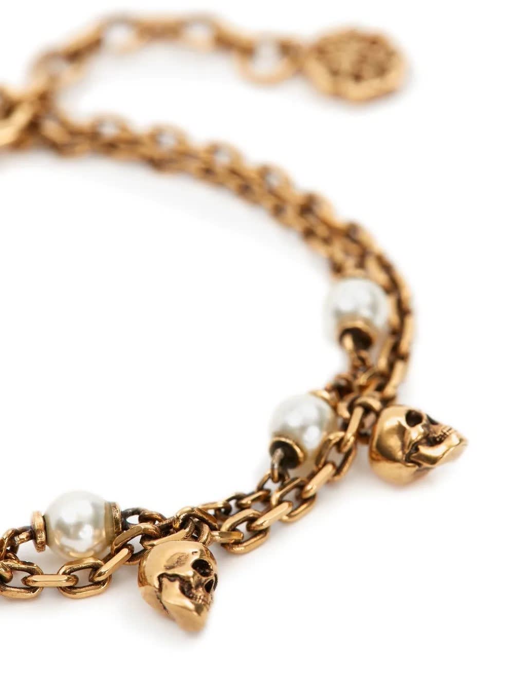 Shop Alexander Mcqueen Skull Pearl Chain Bracelet In Antiqued Gold