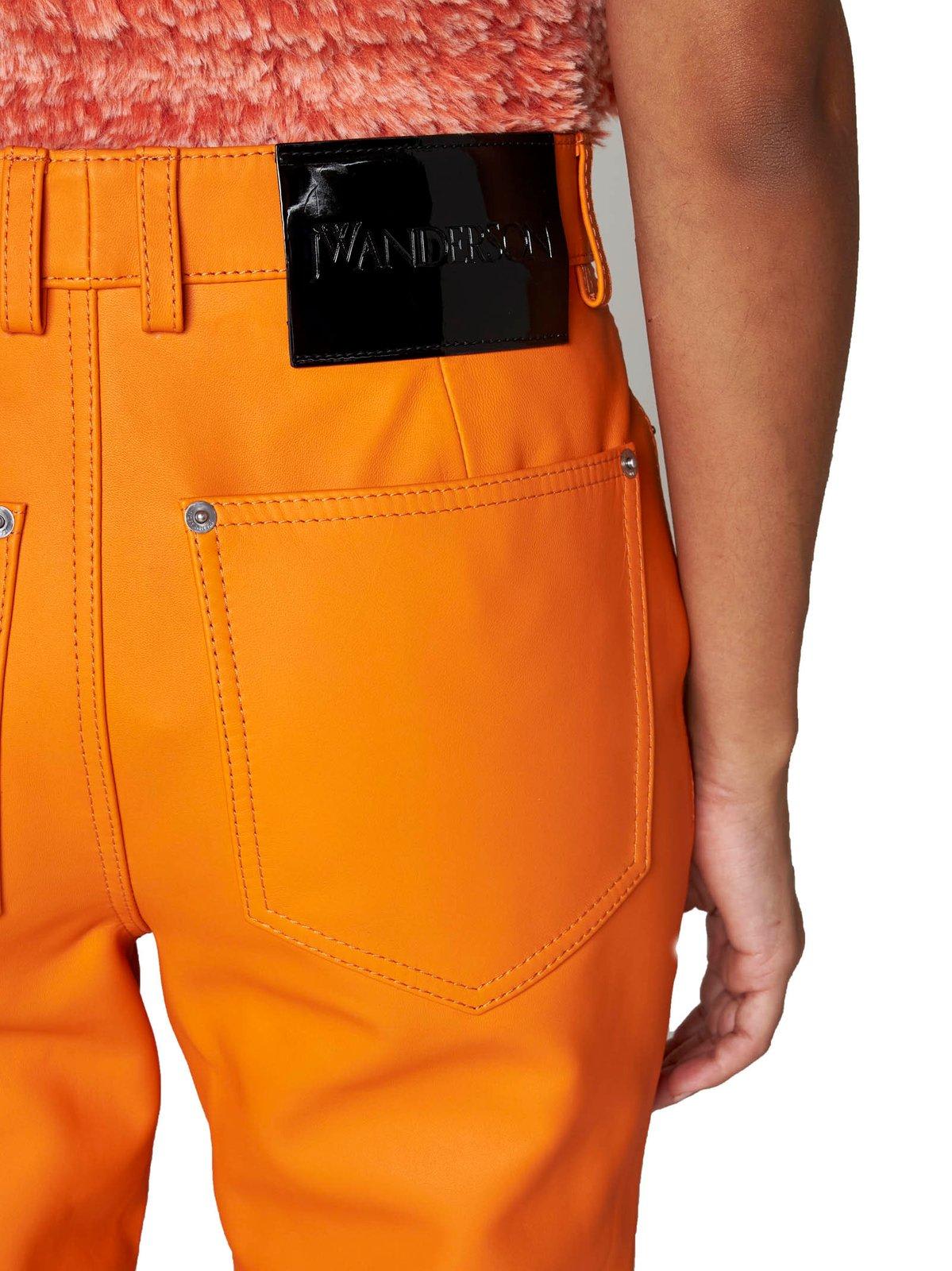 Shop Jw Anderson High-waisted Leather Bootcut Trousers In Orange