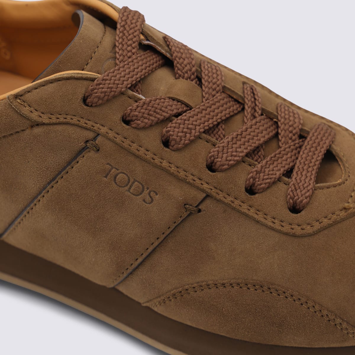 Tod's Brown Low Top Sneakers With Cleat Details On Heel And Sole In Brown