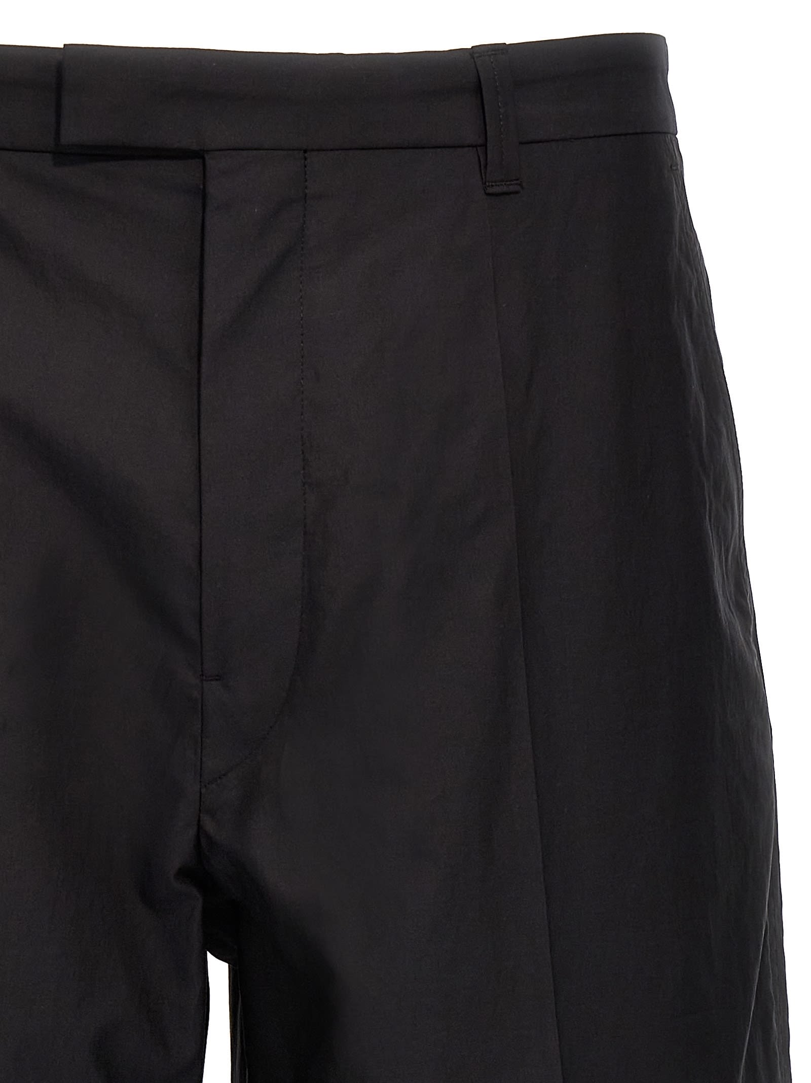 Shop Lemaire Carrot Trousers In Black