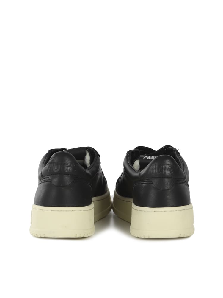 Shop Autry Dallas Low Top Sneakers In Black