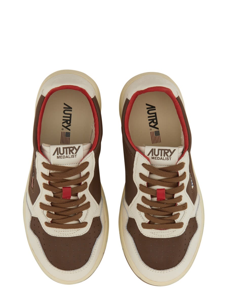 Shop Autry Medalist Sneaker In Brown