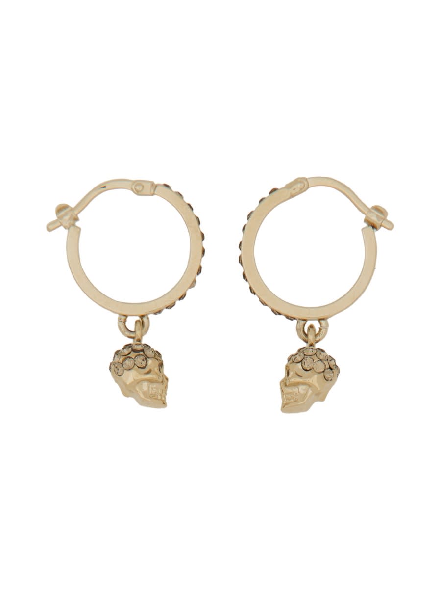 Shop Alexander Mcqueen Skull Hoop Earrings In Gold
