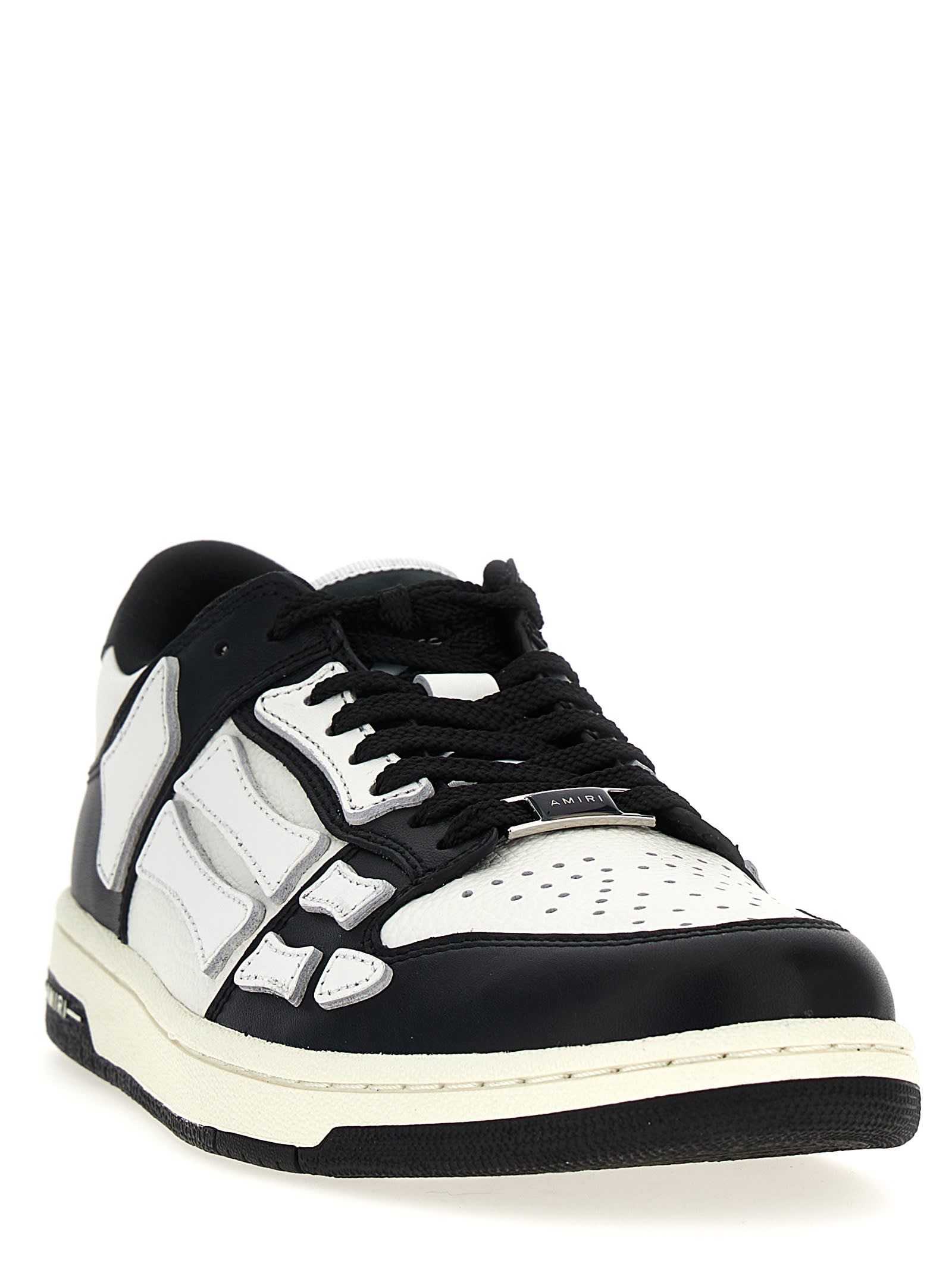 Shop Amiri Skel Top Low Sneakers In White/black