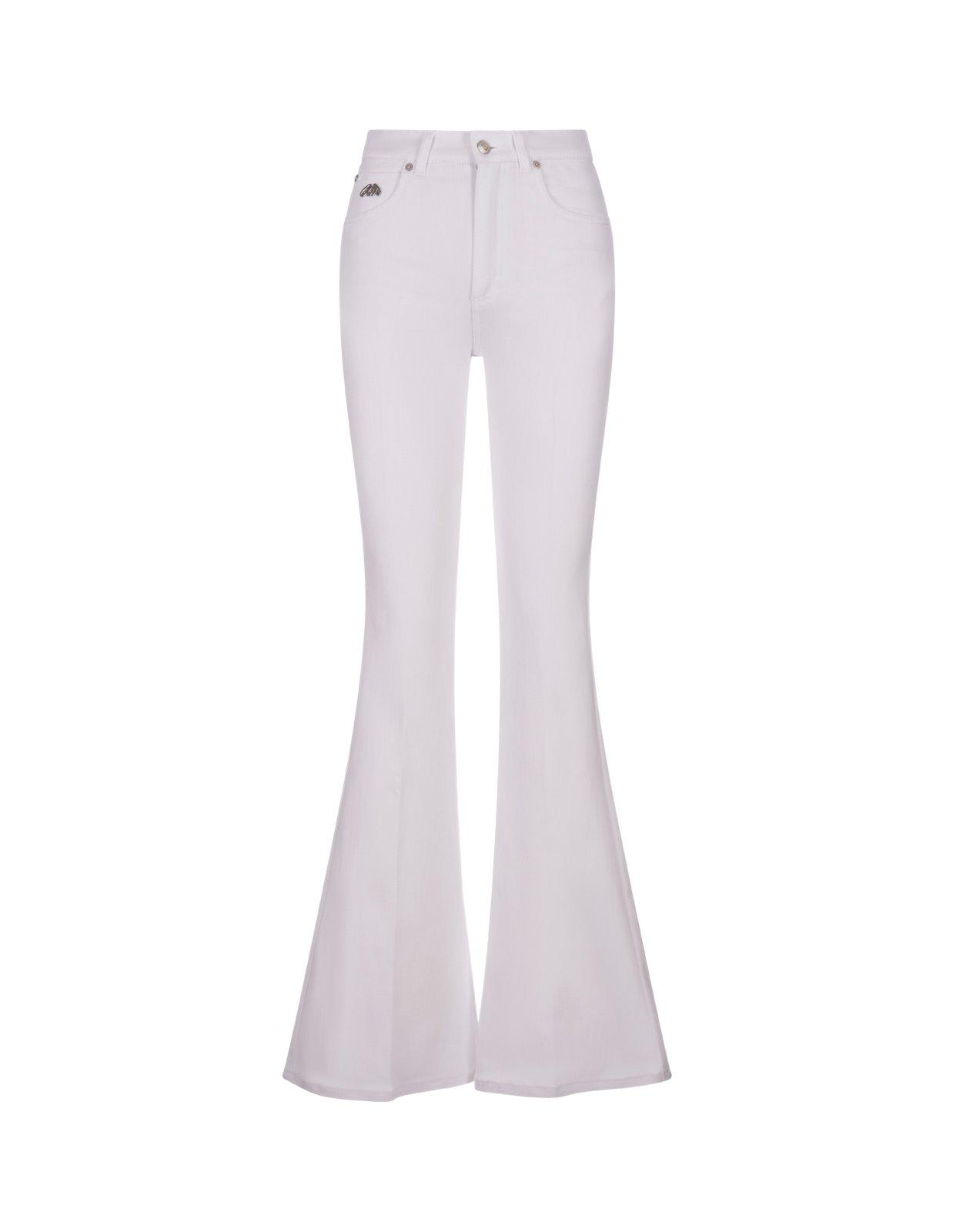 Shop Alexander Mcqueen Logo Patch Flared Jeans In Optical White