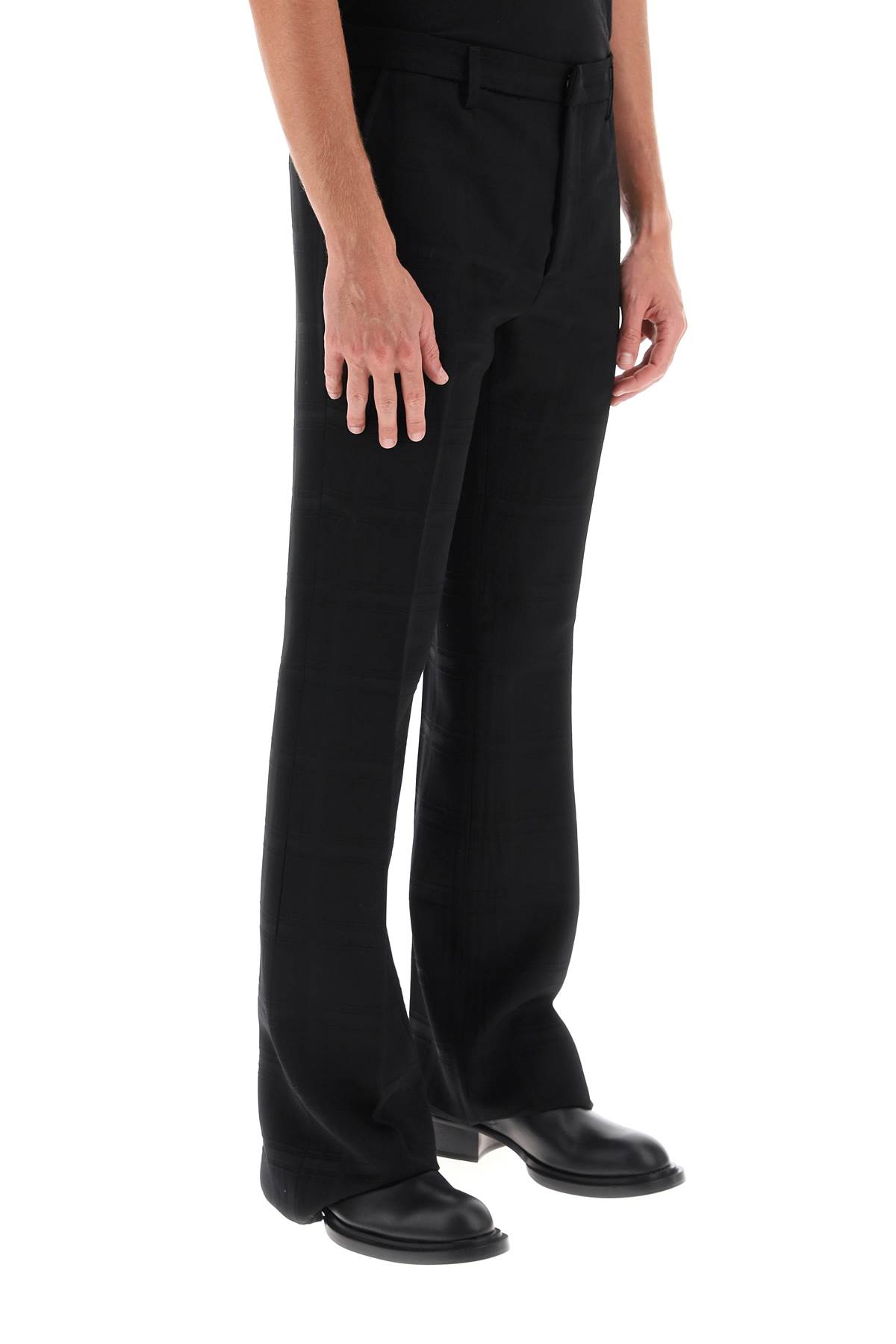 Shop Etro Flared Pants In Virgin Wool In Black (black)
