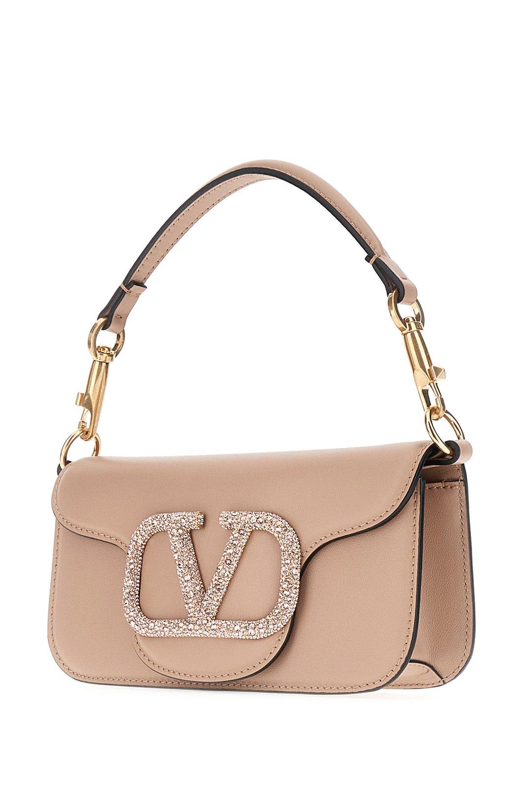 Valentino Logo Embellished Chain Linked Small Shoulder Bag In Pink