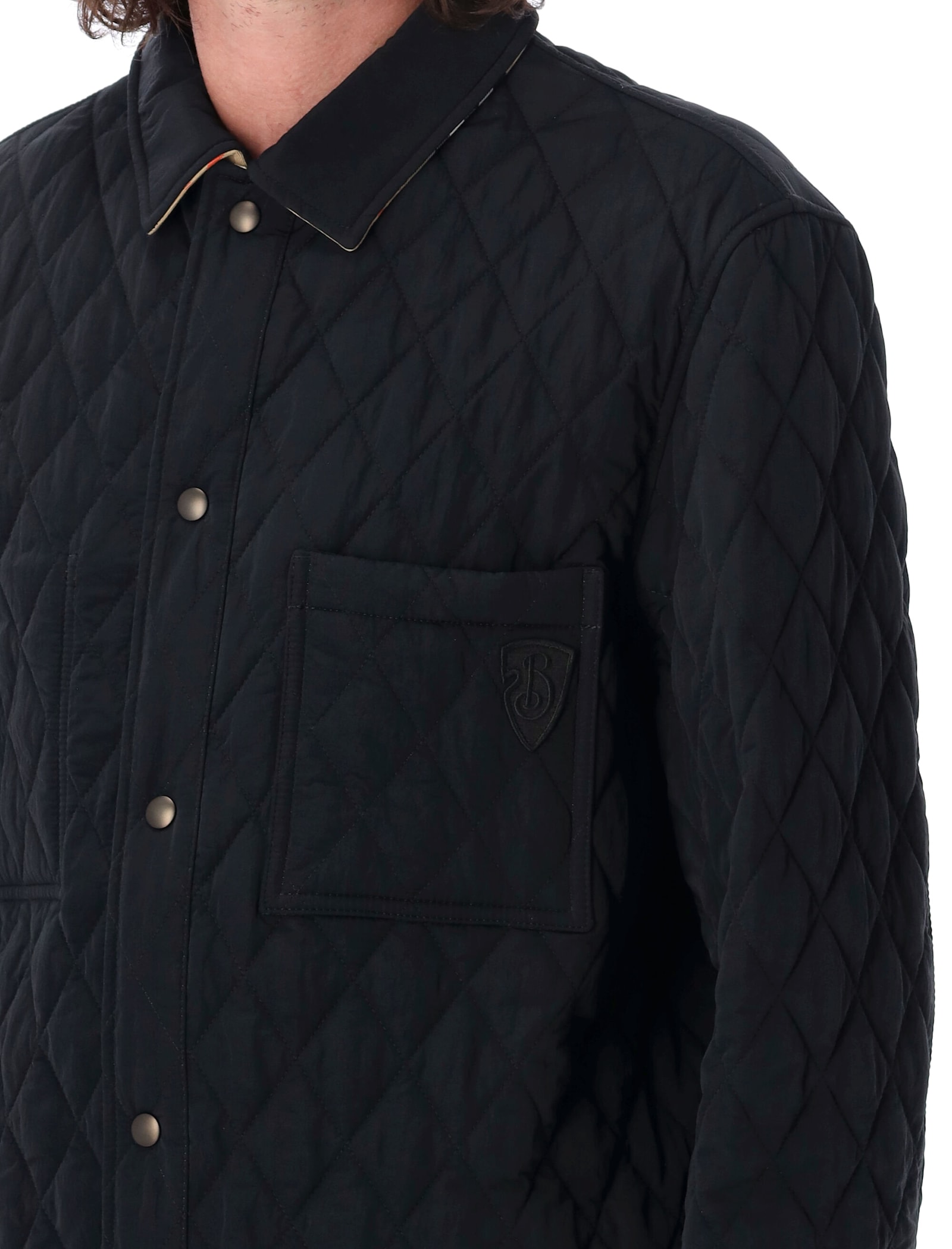 Shop Burberry Reversible Quilted Nylon Overshirt In Black/sand Ip Check