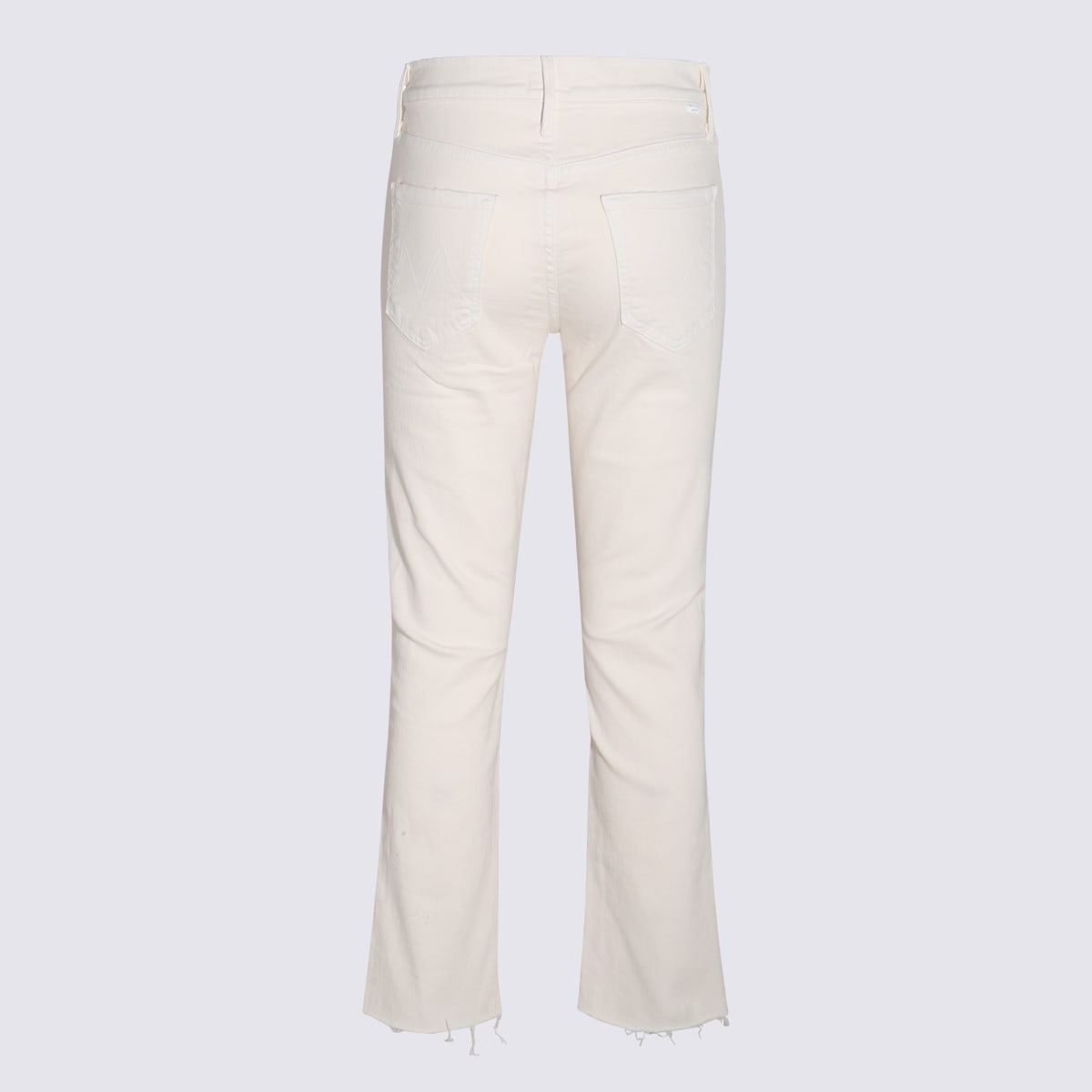 Shop Mother Cream Denim Cropped The Raskal Ripped Ankle Jeans In White
