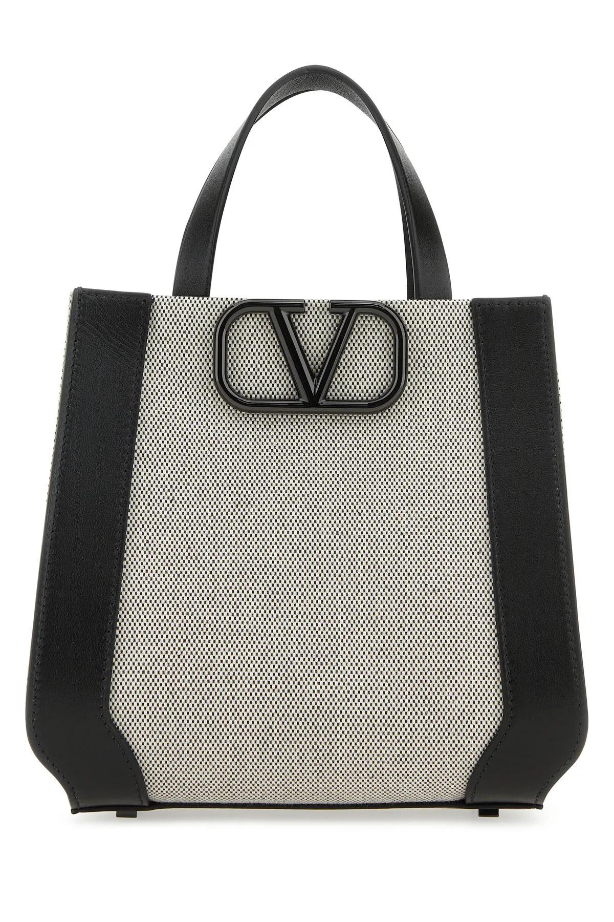 Shop Valentino Two-tone Canvas And Leather Vlogo Handbag In Black
