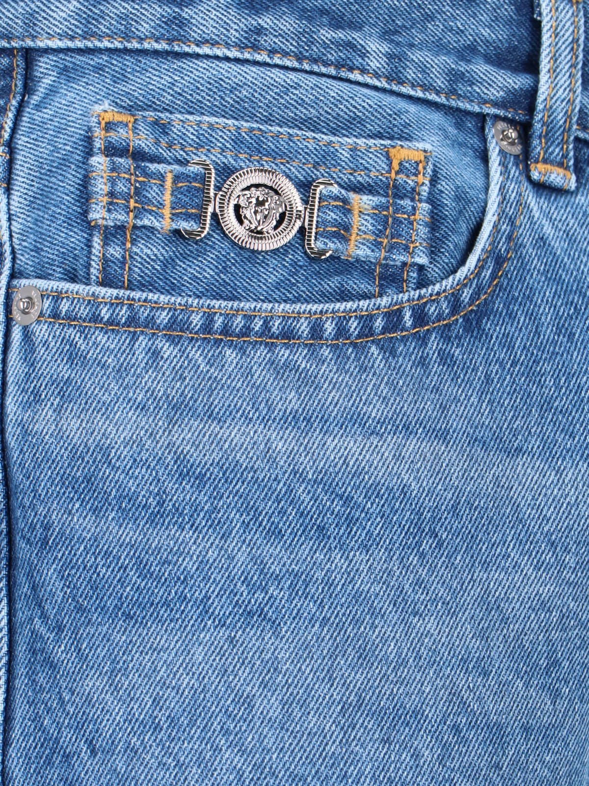Shop Versace Medusa Detail Jeans In Blue