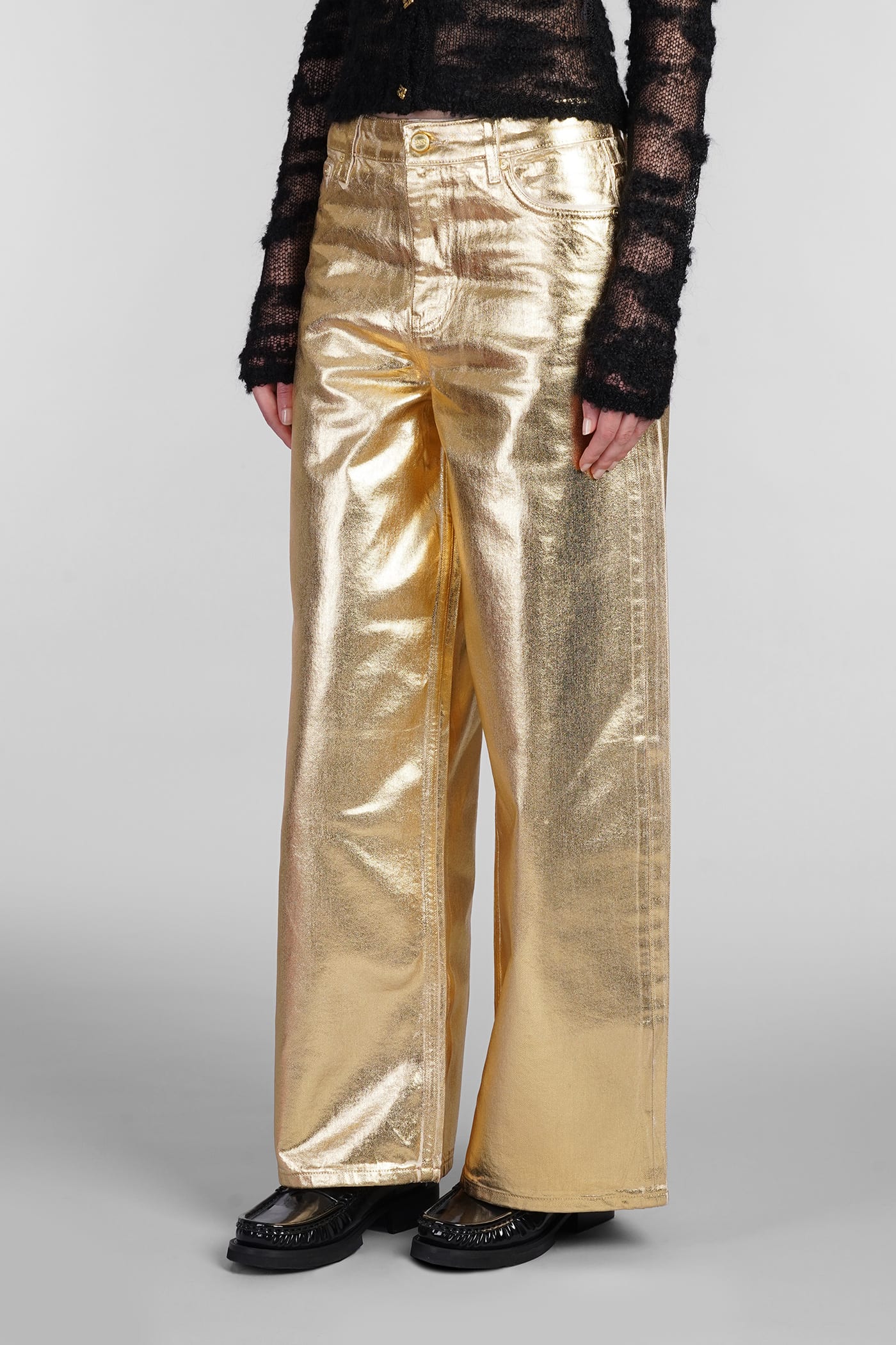 Shop Ganni Jeans In Gold Cotton