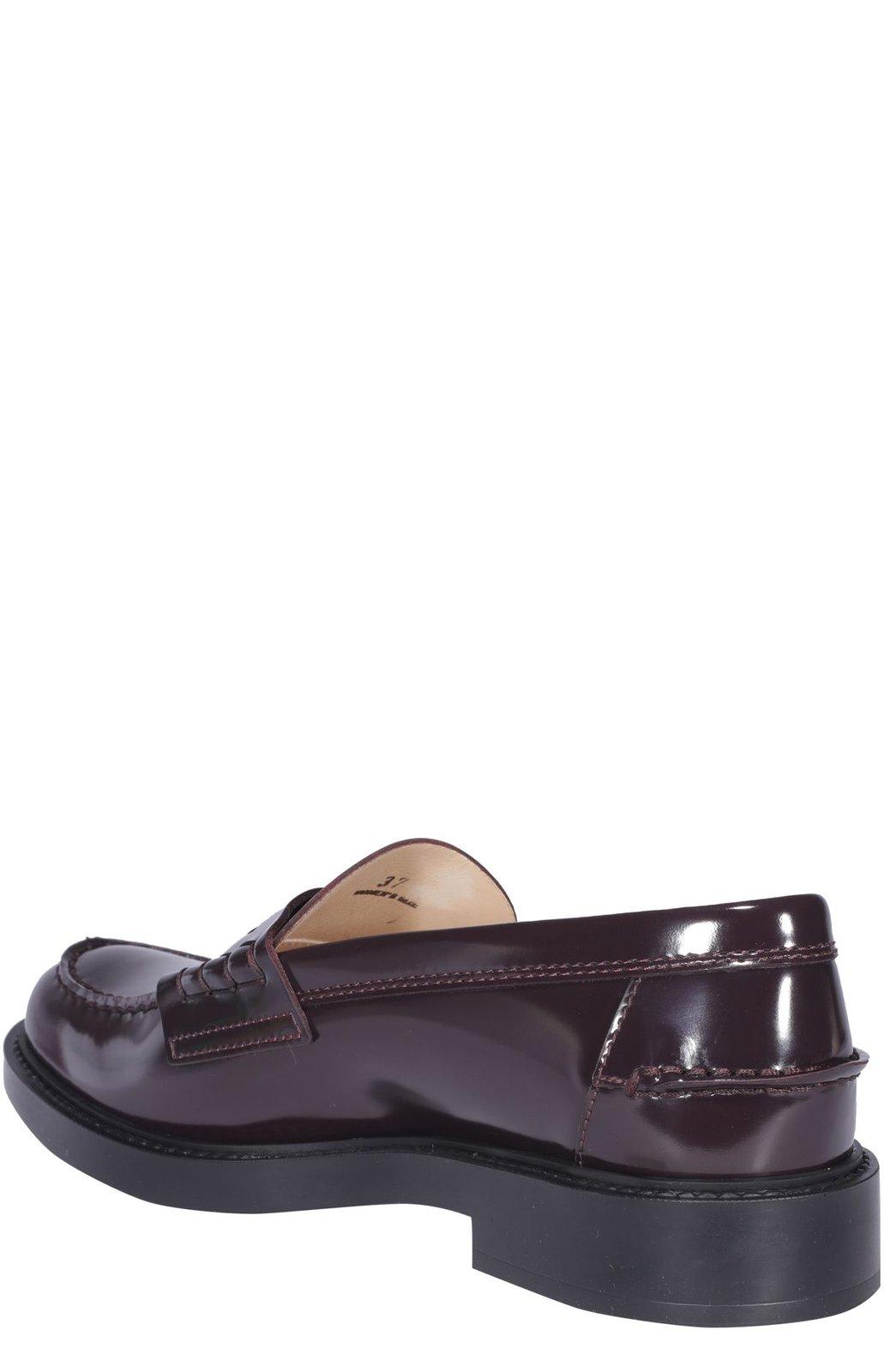Shop Tod's Logo Penny Loafers In Bordeaux