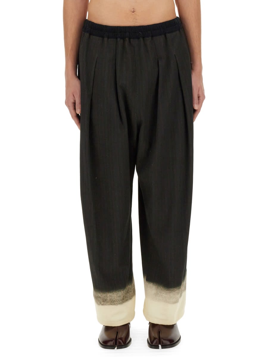 Shop Maison Margiela Trompe Loeil Pinstripe Pants In Black