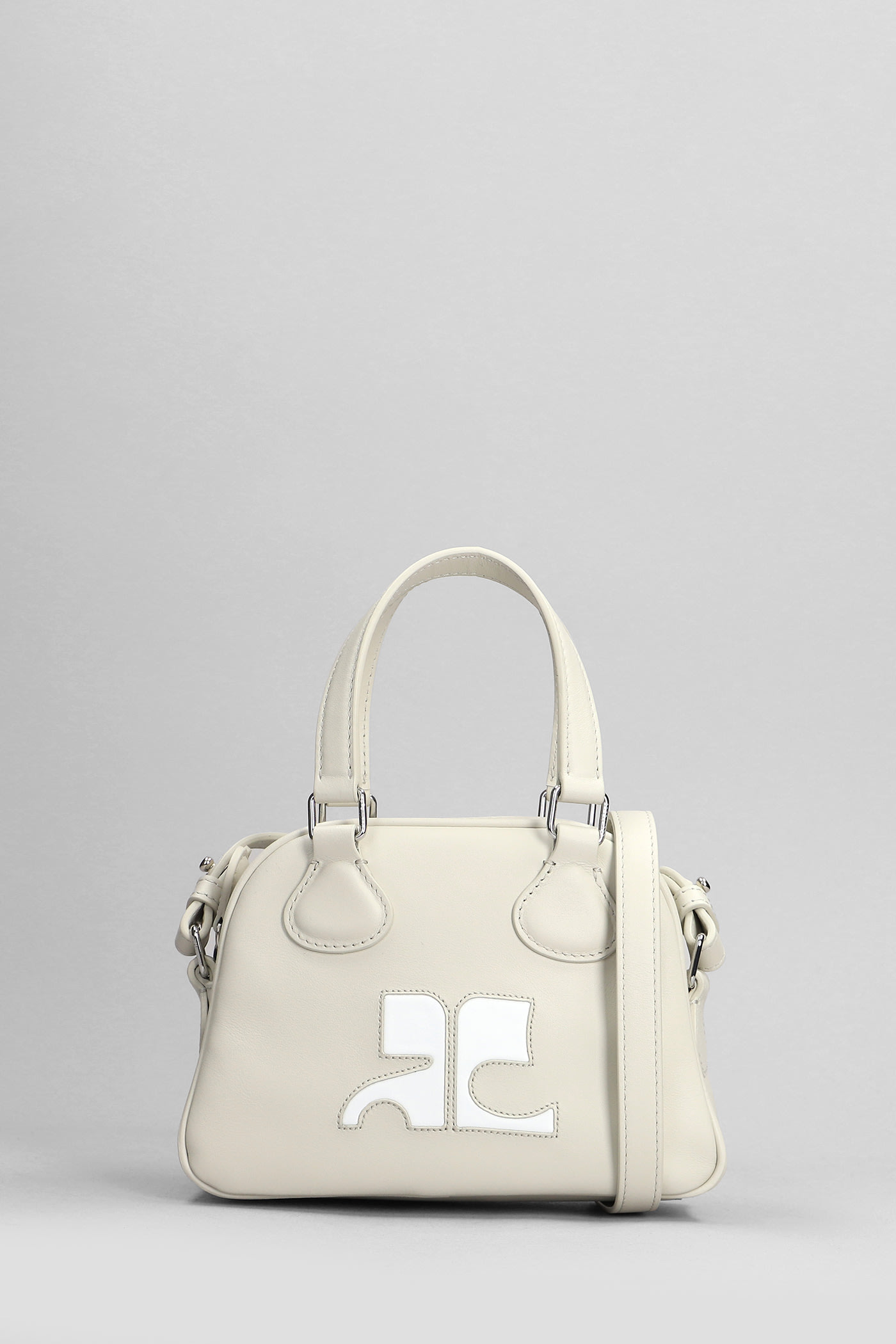 Courrèges Bowling Hand Bag In Beige Leather