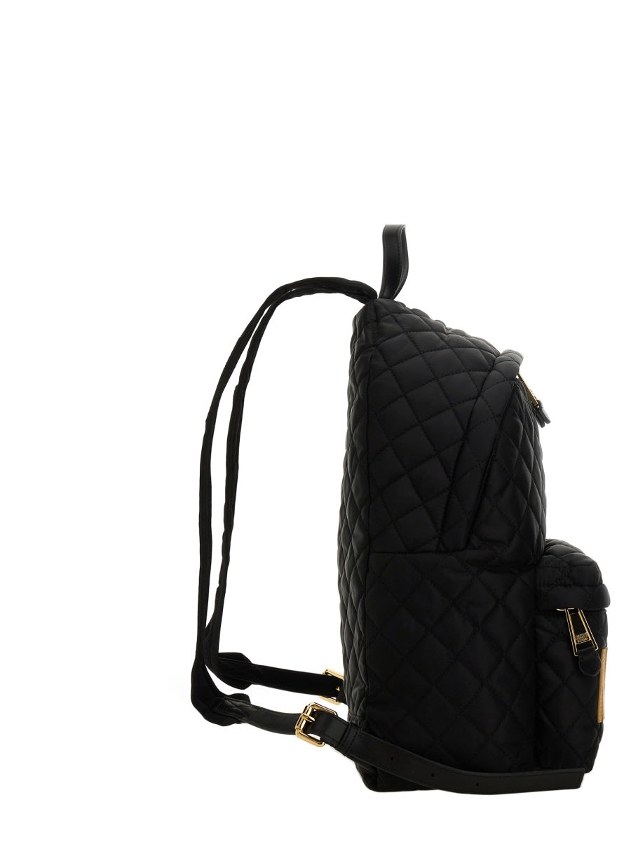 Moschino Quilted Logo Backpack In Black
