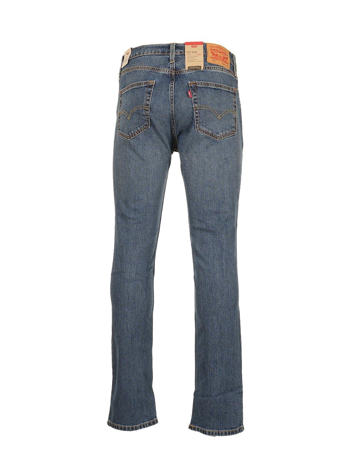 Shop Levi's Mid Rise Straight Leg Jeans In Blue