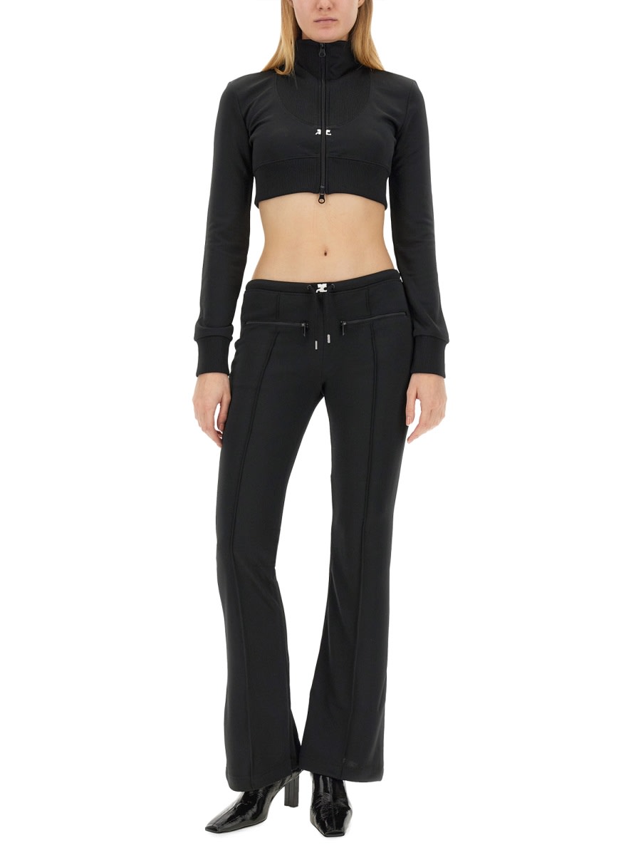 Shop Courrèges Slim Fit Pants In Black