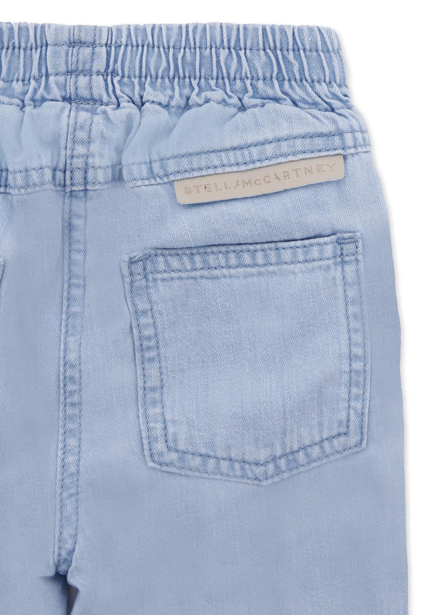 Stella Mccartney Light Blue Jeans For Baby Girl With Flowers In Blue