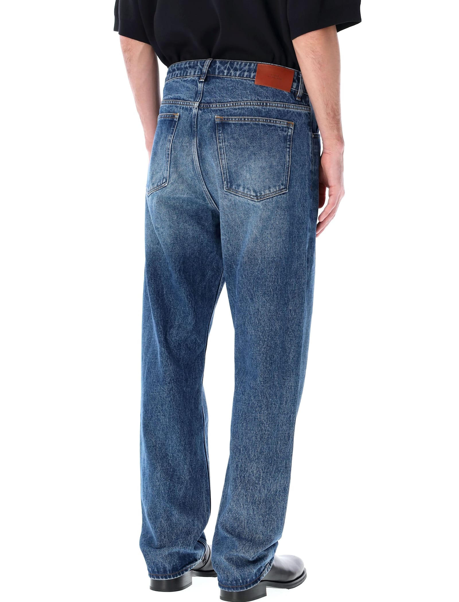 Studio Nicholson Faded Wash Regular Fit Jeans In Worn Indigo