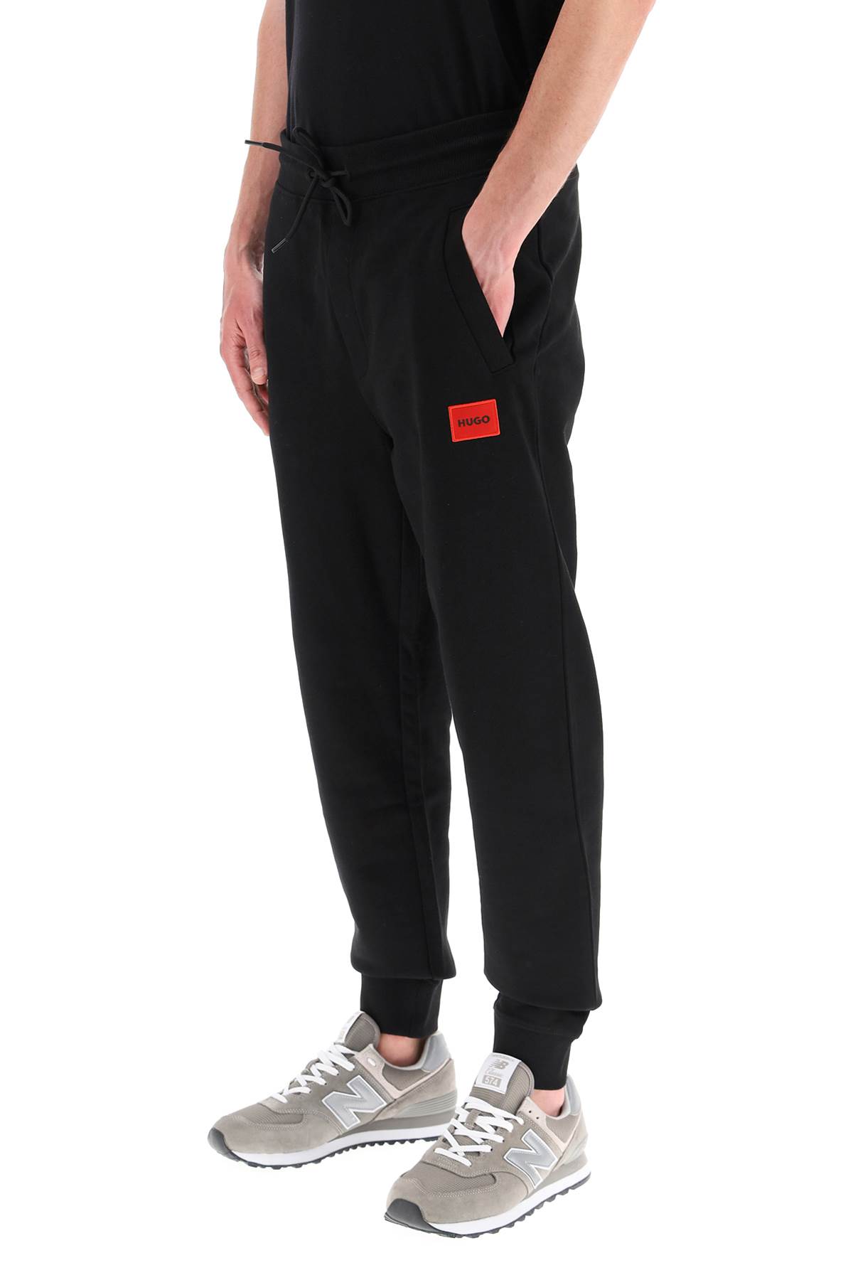 Shop Hugo Boss Logo Patch Sweatpants In Black 001 (black)