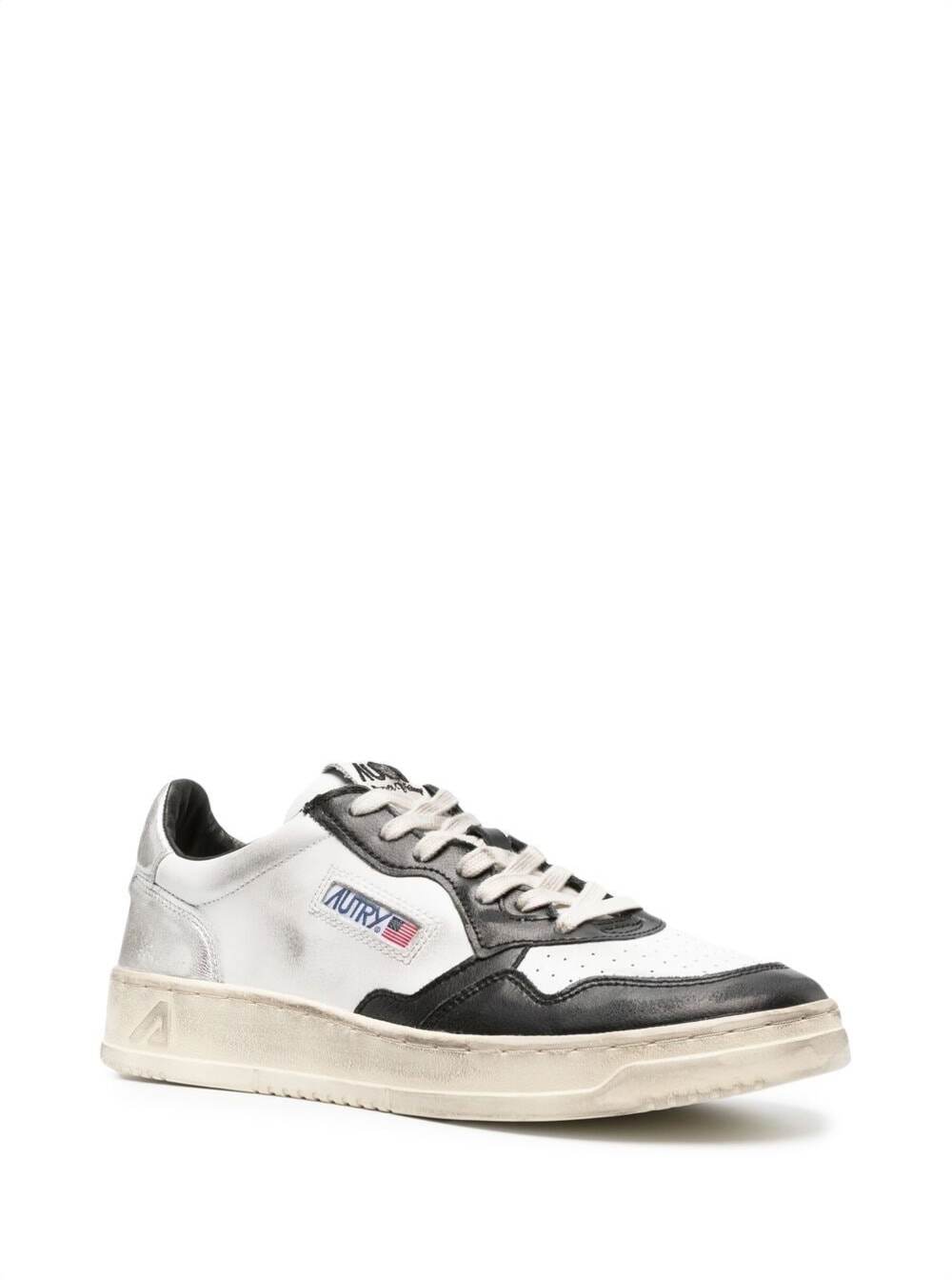 Shop Autry Black And White Medalist Low Top Sneakers Distressed Finish In Cow Leather