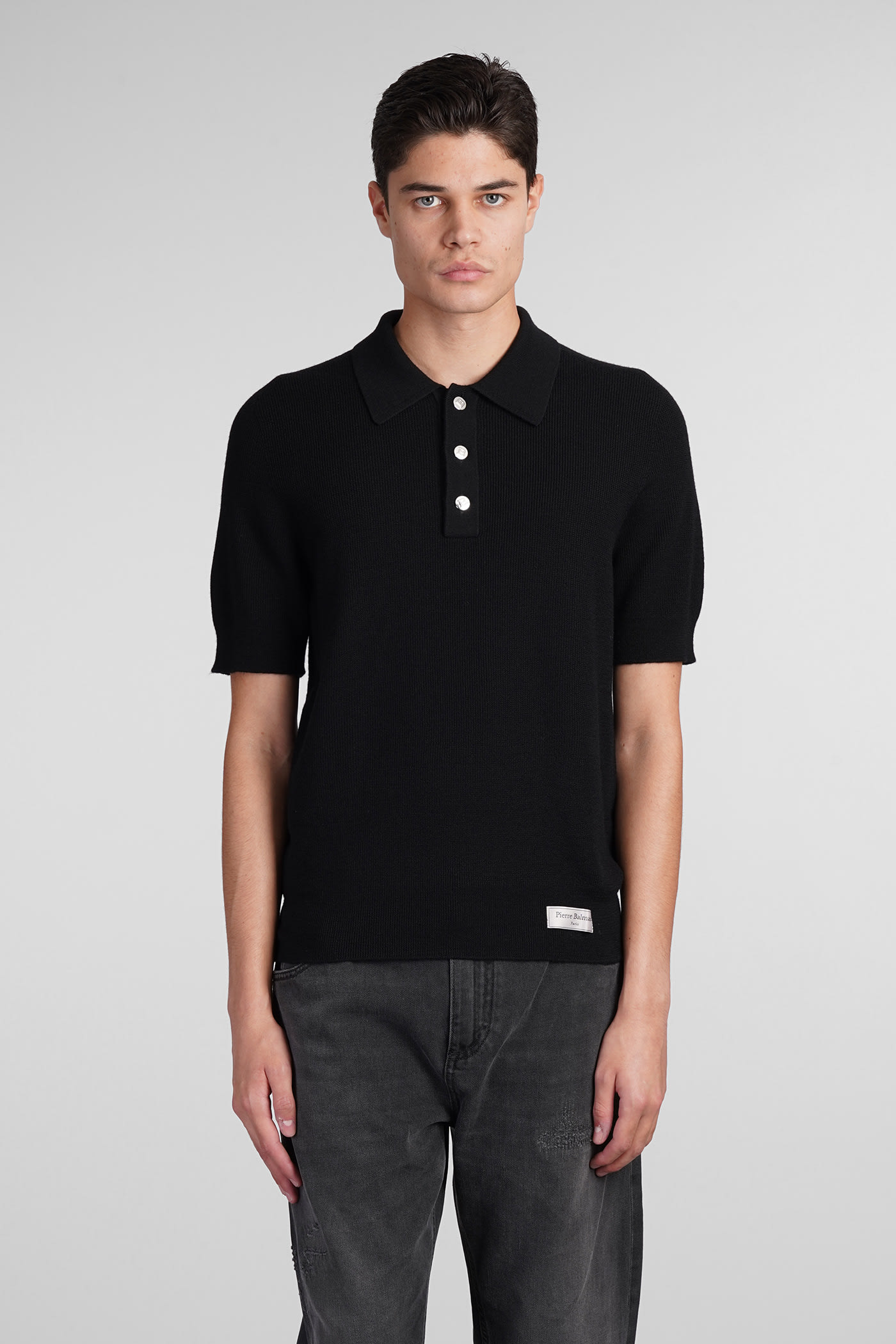 Shop Balmain Polo In Black Wool